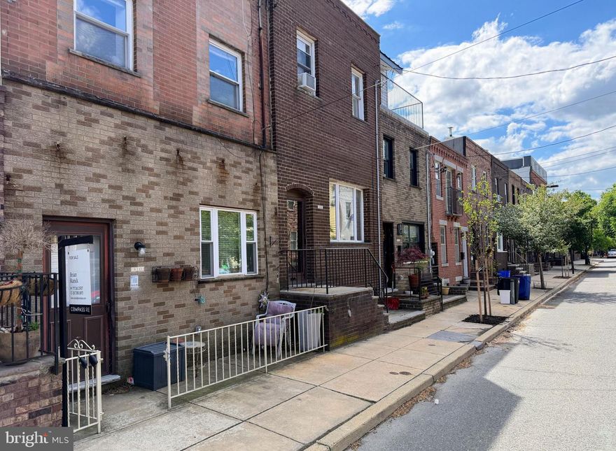 Exceptional opportunity to own a well-maintained, 3-unit multifamily building in Passyunk Square, just blocks from the restaurants and shops on Passyunk Ave. The building used to be a small coffee factory, and was thoughtfully converted into apartments. Each unit has one bedroom and one bathroom, and the 1st floor unit has access to a rear patio and a large partially finished basement. All units have beautiful hardwood floors, separate gas and electric meters, in-unit washer and dryer, and well-designed floor plans. Great opportunity for a savvy homeowner to live in one unit and rent the other two, or for an investor looking for a prime area with strong rental income.