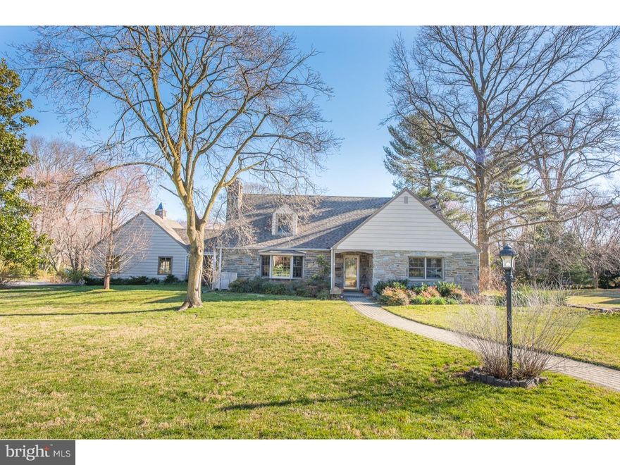 Location, Location! Wonderful large stone Cape, 4/5 Bedrooms. Finished Basement with Kitchen (no stove), Powder Room and gas fireplace. Large Living Room with fireplace and large windows. Family Room with lots of light. This room can serve as 1st floor Bedroom as it has 2 closets and direct access to large Bathroom with shower and Whirlpool Bath. 2 additional Bedroom on 1st floor, one presently used as an Office. Dining Room with 2 corner cabinets and French doors to 14 x 14 Sun Room. Kitchen with eating bar, granite counters, stainless steel dishwasher and lots of oak cabinets. Exit to unheated enclosed Breezeway leading to a 2 car Garage. Second floor has 2 large Bedrooms, one with walk-in California type closet with adjoining Powder Room and shower. Jack and Jill style arrangement. 2 Bedrooms has 2 closets and access to walk-in finished attic space. Adjoins Powder Room and shower. Basement has large utility room with furnace etc, washer and dryer. Also a finished part has wall to wall carpets, Kitchen (no stove) with sink and refrigerator. Lots of cabinets and Powder Room, off this finished Basement which is wonderfully organized. Large storage room. Fantastic location, close to train, schools, Spring Haven Country Club, Wallingford Swimming Club and tennis and paddle club. Close to Swarthmore and Media Boro. Large Beautifully landscaped grounds.