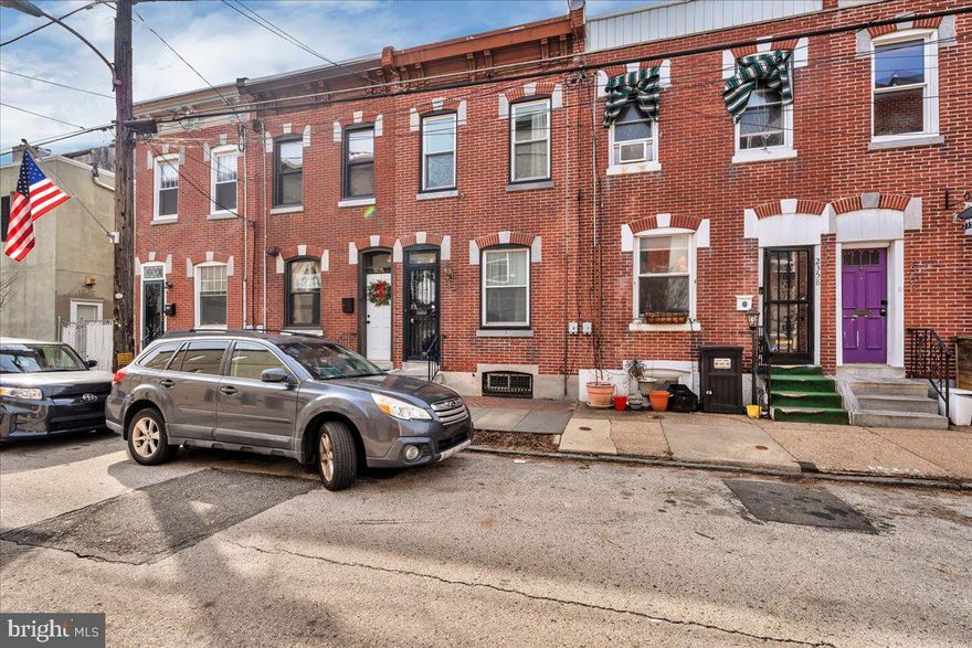 Welcome to your dream home in Fishtown, one of Philadelphia’s most sought-after neighborhoods! This beautifully maintained 2-story townhome offers the perfect blend of modern convenience and timeless charm, the classic brick facade adds to the home’s curb appeal, making it an ideal choice for first-time buyers or anyone looking to enjoy the vibrant Fishtown lifestyle.  As you enter, you will appriciate the warm and inviting atmosphere. The living room features charming beadboard walls and a custom built-in bookshelf, adding both character and functionality to the space. The open floor plan gives you plenty of room for a formal dining room and the kitchen boasts sleek granite countertops, a built in microwave and lots of storage. This home contains 3 spacious bedrooms, including a rear bedroom that doubles as a bright and functional home office, complete with stylish double bi-fold doors—perfect for remote work or creative projects. The full bathroom is bright and light filled thanks to the large skylight overhead, and a convienet linen closet is located in the hall. The finished basement offers endless possibilities such as a home gym, or additional storage. Step outside to your large rear patio with a raised garden that is your private outdoor retreat perfect for morning coffee, summer barbecues, or simply unwinding.  This home also includes practical upgrades, such as a newly installed HVAC system in 2023, ensuring year-round comfort. Living here means you’re just steps away from Fishtown’s hottest restaurants, cafes, and boutiques. Enjoy the convenience of being close to I95 for easy commuting, while still savoring the walkable, community-focused vibe of this iconic neighborhood.