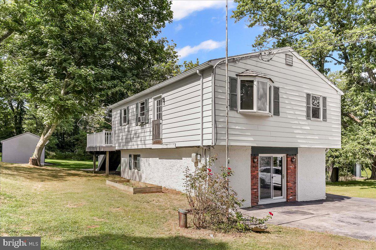 Nice 3 Bedroom , 2 Full Bath home on over 3/4 of an acre. Ground Floor offers a Family Room, a Bedroom with it own full bath, (could be used as a in-law area). Full Mud/Laundry Room. Second Floor has 2 Bedrooms and a full bath, Living Room and large Eat-in kitchen. Sliders to deck off kitchen. Large Deck with stairs down to yard. Nice Large yard with Shed included. Kitchen Frig, Washer/Dryer, Window/A/C unit, John Deer Tractor and Snow Blower included in as-is condition. Room Sizes and Floor Plans in Pics. Quick Settlement Possible! Make your App't Today!