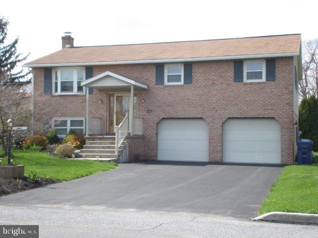 MOVE IN READY 3 bedrooms 1 1/2 baths Bi-level. Enjoy the over sized family room with charming gas fire place, lovely kitchen with island that opens onto the living/ dining, 2 car garage with storage.