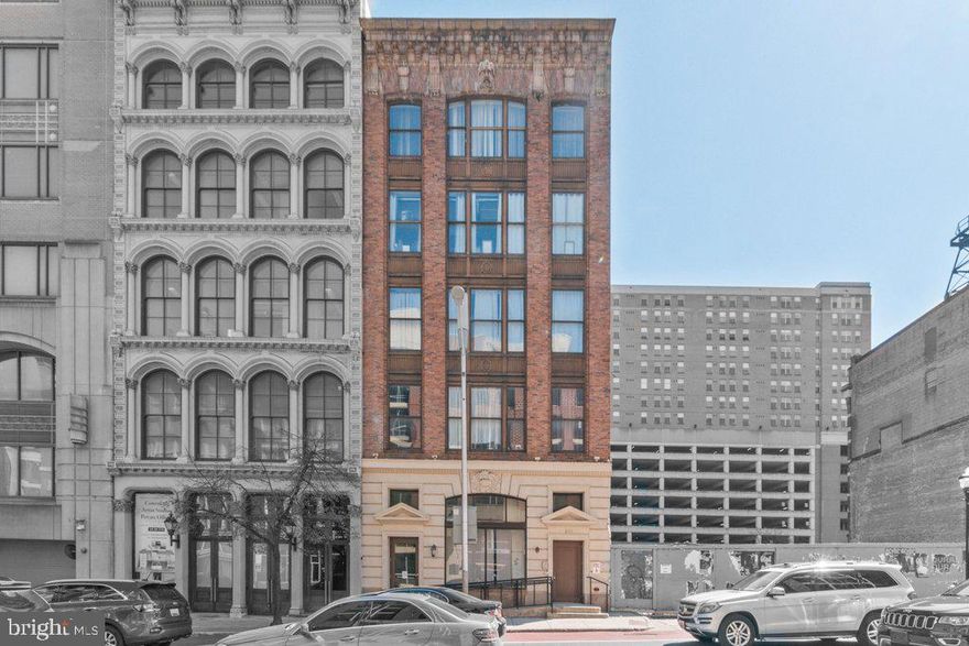 ● Downtown Baltimore hotspot just steps to CFG Bank Arena, Lexington Market, and UMD’s graduate schools—creating a great need for housing.
● Tenants pay electric and water, with additional revenue from 11 garage parking spaces and 11 storage units—maximizing income.
● Full-gut 2015 renovation with 18’ ceilings, exposed brick, and high-end finishes—minimizing cap ex exposure.
● Lead-Free Certification simplifies compliance, reduces turnover costs, and lowers liability exposure for ownership.
West Baltimore Interiors:
Taken from a page out of New York or D.C., 311 West Baltimore Street brings industrial elegance and high-end construction to the heart of Downtown Baltimore. With exposed brick, soaring ceilings, and a full-gut renovation completed in 2015, this five-story mixed-use building offers investors a rare combination of design, durability, and location—just steps from CFG Bank Arena, Lexington Market, and the University of Maryland’s professional schools.

Renovated from the studs, the apartments were built with both aesthetics and longevity in mind. Behind the dramatic 18-foot ceilings, exposed rafters, and hardwood flooring are durable finishes and modern layouts that appeal to long-term tenants. Each unit features real wood cabinetry, granite countertops, and full appliance packages—including 30” electric ranges, French door refrigerators, dishwashers, built-in microwaves, and in-unit laundry. Bathrooms are finished with ceramic tile flooring and surrounds, modern vanities, and both a Jacuzzi soaking tub and a separate walk-in shower. Two-bedroom units include a second full bath.

Utilities and Building Systems:
Each residential unit is equipped with its own electric heat pump, central air conditioning, and a 47-gallon electric water heater. Plumbing was fully upgraded during the 2015 renovation with modern CPVC supply lines and PVC drain lines, and the building is fully sprinklered for fire safety. The two commercial suites share a separate 6-gallon water heater for handwashing sinks. Tenants pay their own electric directly to BGE, while water is billed back based on occupancy. A passenger elevator adds tenant appeal, while two interior stairwells provide additional egress. The building is certified lead-free, significantly reducing liability, eliminating the need for dust wipe testing at turnover, and streamlining compliance. ADA-friendly features include a ramped main entry and elevator access to floors 1 through 5. Eleven indoor garage parking spaces and eleven secure storage units generate additional monthly income and enhance leasing appeal.

Why Invest in Downtown Baltimore:
311 West Baltimore Street sits at the heart of Downtown Baltimore’s resurgence. Just half a block from the fully redeveloped CFG Bank Arena—a $250 million private investment that’s reactivated the city’s entertainment scene—the property also lies 2.5 blocks from the brand-new Lexington Market, the historic Hippodrome Theatre, and the University of Maryland’s downtown campus. The University includes seven professional schools—medicine, pharmacy, dentistry, and more—none of which offer on-campus housing, creating ongoing demand for nearby rental housing.

Further highlighting the area’s momentum, the adjacent lot is slated for 325 West, a proposed 32-story mixed-use high-rise that will include apartment units, an eight-level parking garage, and a full suite of amenities—from a rooftop pool deck to LEED-certified green building systems. With active cultural anchors like the Bromo Seltzer Arts Tower, Everyman Theatre, and the Hippodrome just blocks away, this pocket of the city is experiencing a surge in both private and public investment—positioning 311 West Baltimore as a rare opportunity to own in a true growth corridor.

Investment Summary:
$4,350,000
$217,500 Per Unit
$154 Per Sq. Ft.
8.4 Times Actual Rents (GRM)
7.77% Cap Rate
7.1% Projected Cash-on-Cash Return