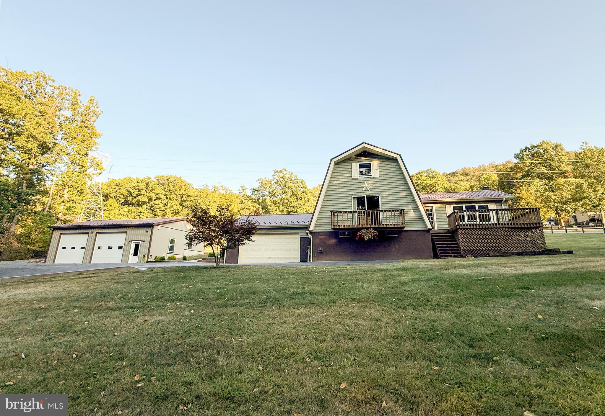 Welcome home to 78 Fairview Road! Don't miss your chance to own this unique home with space inside and out. This well maintained A-frame offers cozy charm and practical space while being nestled on a full acre of land. Step inside to a newly remodeled living room, updated half bath, plus a bright master bedroom with new skylights. Other bonuses are a new metal roof and newer sewage system. With 3 full bedrooms and 1.5 baths this charming property combines cozy character with plenty of outdoor space. Enjoy peaceful country living while still being a short drive to town. The detached workshop is perfect for hobbies, storage, or small business needs. With plenty of room to spread out, this property is ideal as a full time residence or even a weekend retreat!
