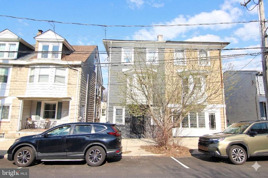 You won’t want to miss this meticulously maintained twin home in the heart of Conshohocken Borough! Step inside to a spacious living room that flows seamlessly into the dining area and kitchen, creating an open and inviting main level.  Hardwood floors run throughout the home, adding warmth and continuity to every space. The modern kitchen features quartz countertops, white shaker-style cabinetry, gas cooking, and stainless steel appliances. The second level offers two generously sized bedrooms with closet space, a full hall bathroom with a tub/shower and custom tile, and a conveniently located laundry room. The top floor is dedicated to an expansive primary suite, complete with a private bathroom featuring dual vanities and a custom tiled stall shower with glass doors. The walk-in closet is impressively large and a true highlight of the home. Out back, enjoy a private yard ideal for entertaining or grilling, along with a welcoming front porch, perfect for morning coffee or evening unwinding. Located in the award-winning Colonial School District, this home is walkable to downtown Conshohocken’s bars, restaurants, shopping, and the train station, with quick access to major routes including 476, 76, and the Turnpike.