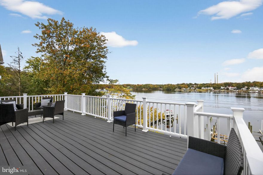 Experience luxury waterfront living at 1004 Nabbs Creek Road in Glen Burnie! This stunning 4-bedroom, 3.5-bath home offers the perfect blend of elegance and comfort. With three spacious bedrooms on the upper level and a versatile main-level bedroom or office, this home adapts to your lifestyle. Enjoy a beautifully updated kitchen with modern appliances, stylishly renovated bathrooms, and open spaces designed for entertaining and relaxation. Step outside to your private pier with direct water access—perfect for boating, fishing, or simply soaking in the serene views. This is waterfront living at its finest!