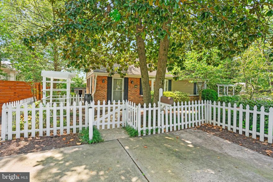 Welcome to this renovated 2 level rambler just steps away from grocery, restaurants, shopping, day care and senior center.  Everything you need is walkable in this sought after neighborhood. Its easy living with kitchen, family room, primary bedroom and laundry on main level.  Over 2400 finished sq ft and almost 1000 unfinished/ storage. 
Owners have expanded this home and vaulted the ceilings for an open airy feeling.  The expansion now includes 4 bedrooms, office area, 3.5 baths, family room and rec room with kitchenette. The kitchen  has a large center island  and window seating.  It was renovated in 2019 Shenandoah cabinetry was added plus new appliances added in 2023.  The garden is a certified natures preserve wildlife habitat and offers a herb garden as well.