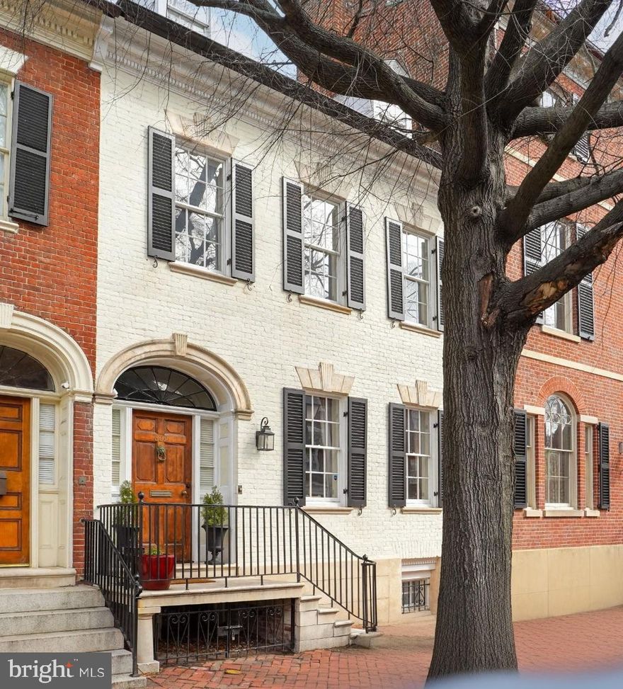 YOUR DREAM HOME IN THE HEART OF OLD TOWN – 609 Cameron Street! Step into a piece of history with 609 Cameron Street—an extraordinary Federal-style townhome built in 1780, perfectly blending timeless charm with modern comfort. Fully renovated between 2020 and 2022, this 4,000 sq. ft. residence offers a rare opportunity to own a truly special home in the heart of Old Town Alexandria. *From the moment you walk in, you'll be captivated by the original wide-planked heart pine floors, detailed crown molding, and solid wood doors that whisper stories of the past. With soaring 10-foot ceilings in the primary suite and 9-foot ceilings throughout the rest of the home, every room feels open and inviting. Four fireplaces (non-functional) add to the historic character, while thoughtful updates ensure modern livability. Unlike some neighboring homes, this one has never been chopped up into apartments or commercial space—it has always been a grand, single-family residence. **A LAYOUT THAT JUST MAKES SENSE - This home is designed for both comfortable everyday living and effortless entertaining. With four spacious bedrooms, each with an en suite bathroom, plus a main-level powder room, everyone has their retreat. *The primary suite is a dream—airy and elegant, with high ceilings, a fireplace, an en suite bath, a dressing area, and a separate toilet room. Two additional second-floor bedrooms with en suite baths provide flexibility for family or guests, while the third-floor suite is the perfect bonus space for a bedroom, office, or studio. Downstairs, the bright lower level features high ceilings and a full bath—complete with the home’s only soaking tub, making it a cozy getaway. *The beautifully updated kitchen is a cook’s delight, outfitted with high-end appliances, including a Kucht stove and cooktop, a KitchenAid refrigerator and microwave, and a Bosch dishwasher. Whether you're whipping up a quick breakfast or hosting a dinner party, this space is perfect. **OUTDOOR SPACE AND UNBEATABLE LOCATION - The large, private courtyard is a gem—perfect for enjoying morning coffee, hosting friends, or tending to a lush garden. A gated side entrance provides convenient vehicle access, and a deeded off-street parking space nearby ensures stress-free parking. *Living in Old Town means you can leave the car behind. Take your pup for a walk along the river, pop into your favorite boutique, or meet friends for dinner—all just steps from your front door. With easy access to D.C., this location is the best of both worlds—historic charm with modern convenience. If you’ve been searching for a home that stands out, 609 Cameron Street awaits you. Schedule your private tour today and fall in love with a house that’s as unique as you are.