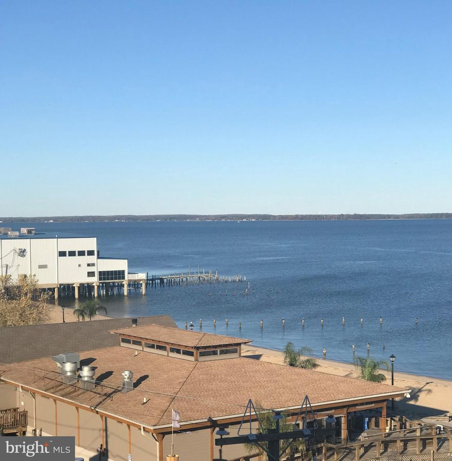 Beautiful Condo with panoramic views of the Potomac River. Available April 1, 2025. Fabulous location in the town of Colonial Beach. Top floor, corner unit, hardwood floors, granite countertops, stainless appliances, one covered parking space, large owner's suite with river views and in home laundry room. Colonial Beach is a golf cart community that includes public beaches, public boat ramp, boardwalk, marinas, fabulous restaurants, tiki bars and breweries. Colonial Beach is known as "The Playground on the Potomac."  Walk, hike or ride your bike. No Pets, No smoking permitted. An easy ride to explore the wineries of the Northern Neck as well. One and 1/2 hours from DC and Richmond and 45 minutes from Fredericksburg. Come on over! Put your toes in the sand! Landlord will consider credit score, criminal history and past tenant record. There is a $50 application fee for each tenant 18 or over.