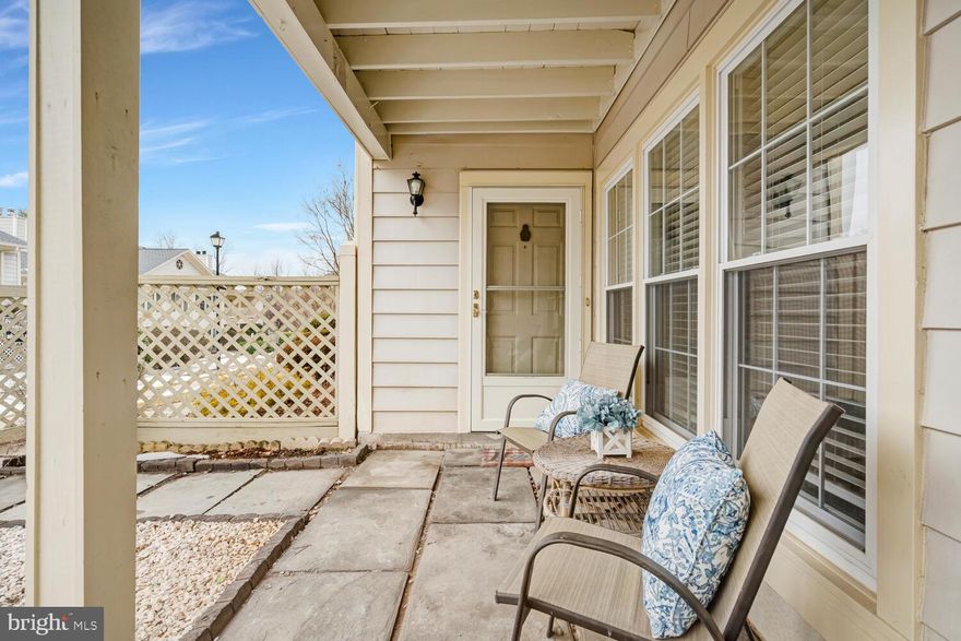 Simply irresistible! Highly coveted south-facing garden-style corner condo with a lush, fully fenced private courtyard in the heart of Germantown! This incredibly spacious & bright two-bedroom ground unit has been meticulously maintained and updated.  The kitchen upgrade in 2023 included new cabinets, backsplash, dishwasher, hardware as well as quartz countertops. The rest of the home offers a sun-drenched open living & dining area with a wood-burning fireplace & built-in bookcases, amply sized primary bedroom with an en-suite bath, huge walk-in closet, and direct access to the slate-clad patio. A second large bedroom with its own walk-in closet awaits on the other side of the condo along with another full bathroom, plus in-unit laundry, private extra storage, and plenty of free parking! Additional updates to the home include HVAC (2023), Hot Water Heater (2026) and carpet (2026). Centrally located near parks, restaurants, shopping, & groceries, as well as community amenities including playgrounds, tennis courts, & two Waters Landing community pool means you are close to it all! A commuter's dream, this home is close to I- 270 and only a few miles to the Germantown Marc Station! Move-in ready, this condo is ready to be called home! Welcome home to Shadyside Way!