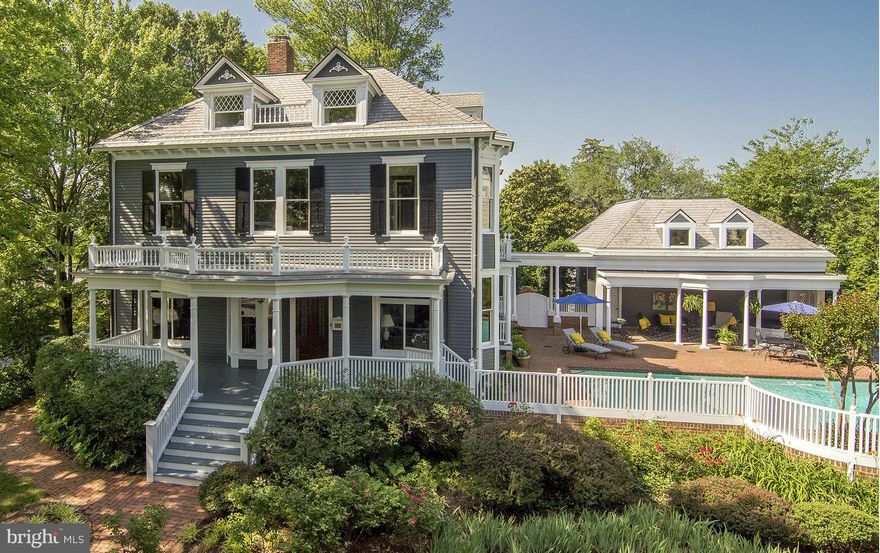 Priced for today's market! Stately, restored,1903 Georgian Revival home situated on prominent double lot in Murray Hill.  5 BR residence is beautifully landscaped w/flower gardens, private pool/entertaining area, screened porch & 2 car garage w/storage. Original staircase, floors, woodwork & doors. Finished lower lever. Baths and kitchen in need of updates.