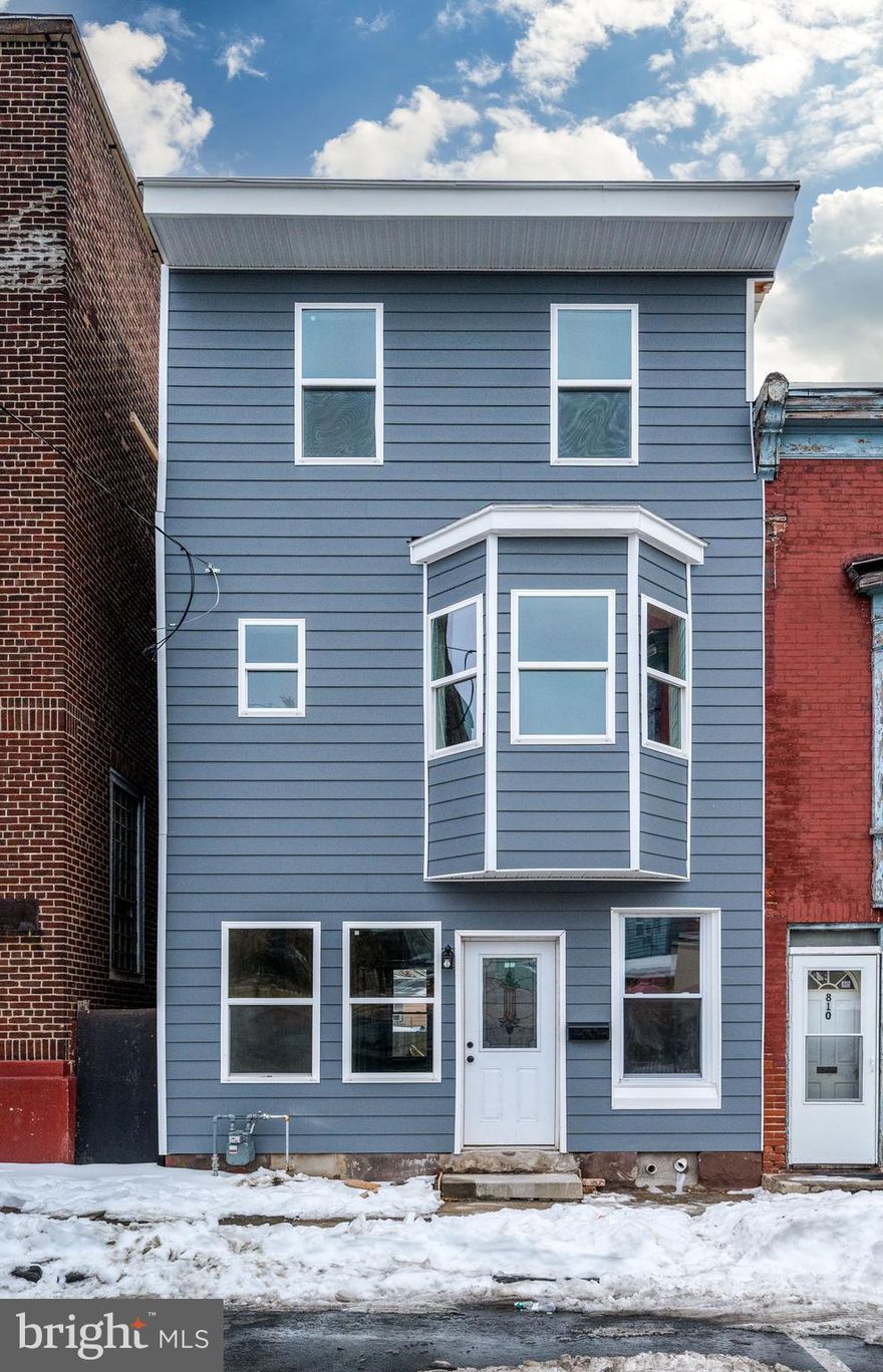 Welcome to a true top-to-bottom transformation. This stunning home has been completely rebuilt from the studs, offering the peace of mind of brand-new construction with the charm of an established neighborhood.

Every major component has been replaced — new mechanicals, plumbing, electrical, windows, roof, lighting, flooring, kitchen, and bathrooms. Enjoy efficient gas heat with central forced air and modern finishes throughout.

The main level features inviting living and dining spaces, a beautifully updated kitchen, and a convenient half bath. Upstairs, you’ll find four comfortable bedrooms, a full bathroom, and a flexible family room or home office ideal for today’s lifestyle.

Plus, enjoy the added benefit of off-street parking — a valuable feature for everyday convenience.

This is truly move-in ready living with nothing left to update.