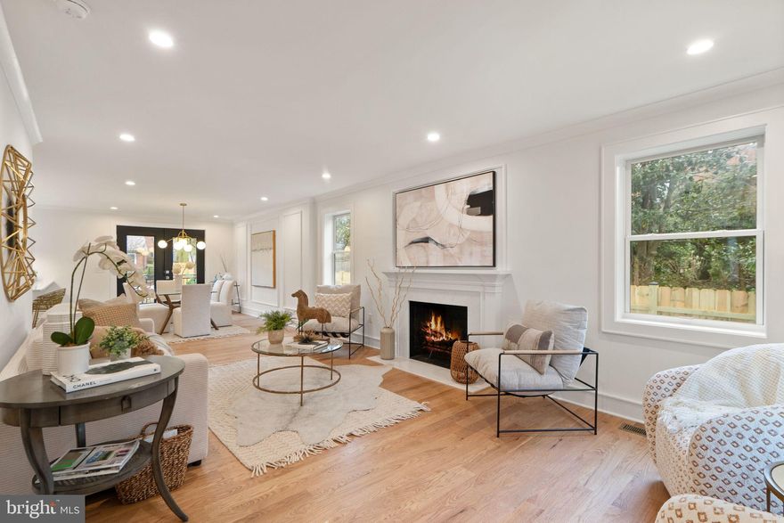 Welcome to this circa-1939, meticulously restored four level gem in the heart of AU Park.  This charming contemporary colonial features 6 bedrooms and 6 full bathrooms over its lovingly renovated 4 levels of living. The main living level hosts an open living and dining concept, LARGE gourmet kitchen with an island perfect for entertaining, deliciously designed butler’s pantry and the perfectly executed utilitarian mudroom with built-in storage that comes in off of the backyard/ parking area. The second level has 3 bedrooms and 3 full baths including the enviable primary suite with attached chic spa-like bath with an oversized, luxurious walk-in shower. A finished attic / 3rd floor loft space and additional bedroom and full bath are the perfect bonus. The lower level has an additional living space, kitchenette, bedroom and full bathroom are the cherry on top (or bottom as it were) of this home. A sizeable rear deck and backyard complete the package.