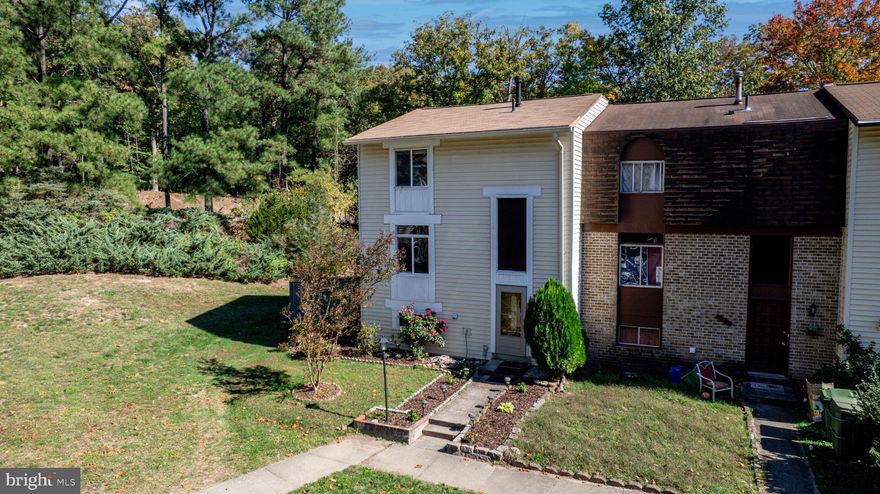 Welcome to this charming three-level end unit townhouse located in the highly sought-after Lake Ridge community. With 3 bedrooms and 2.5 bathrooms, this home offers comfortable and spacious living.

The HVAC and roof are both just 6 years young, providing peace of mind for the new homeowner. As you enter the main level, you'll be greeted by a bright kitchen with ceramic tile floors, elegant granite counters, and newer cabinets and appliances, all of which were replaced in 2018. The large living room and separate dining area feature beautiful wood floors, creating a warm and inviting atmosphere. Step out onto the covered deck, where you can relax and enjoy the serene view of the surrounding trees.

Moving to the upper level, you'll find three well-appointed bedrooms, each with carpeted floors A full bath is also on this level.

The lower level is fully finished, offering a versatile space that could serve as a fourth bedroom or a flex area to suit your needs. French doors lead to the fully fenced rear yard, providing a private outdoor retreat.

The Lake Ridge community boasts an array of amenities, including several pools, playgrounds, and community centers for all your recreational needs. A nearby dog park is perfect for furry friends, and Lake Ridge Park, a mere 5 minutes away, offers a picturesque lake, boat rentals, a golf course, playground, and picnic pavilions for endless outdoor enjoyment.

Don't miss out on this opportunity to make this delightful townhouse your new home! Schedule a showing today.