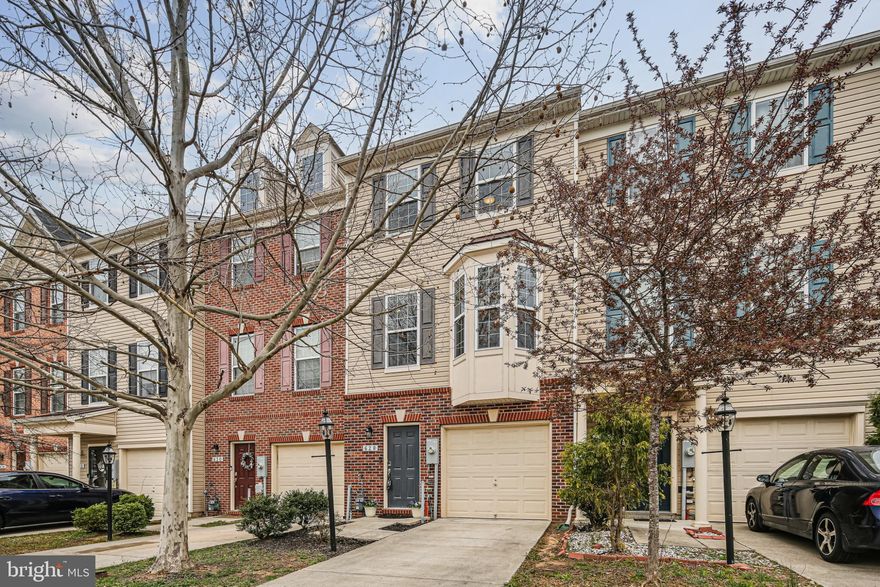 Welcome to this beautifully maintained garage townhome in the highly desirable community of The Pointe at Tanyard Springs, a true turnkey gem! From the moment you step inside, you’ll feel right at home. The main level is bright and inviting with gleaming hardwood floors and an open kitchen/dining layout perfect for everyday living and entertaining. You’ll love the modern touches: granite countertops, stainless steel appliances, 42” cabinets, and a spacious island which all lead out to a low-maintenance deck where you can sip your morning coffee or host summer cookouts. The living room, just off the kitchen, is full of charm and natural light thanks to a beautiful bay window, an ideal spot to relax with family or friends. Upstairs, you’ll find two generously sized bedrooms and two full bathrooms, including a peaceful Owner’s Suite with a walk-in closet and private bath. Downstairs, the entry-level features a welcoming foyer and a versatile recreation/family room with access to the backyard, perfect for playtime, movie nights, or your work-from-home setup. And let’s talk about community perks! Tanyard Springs offers something for everyone!  It includes a pool, clubhouse, tennis and basketball courts, dog park, community garden, trails, and more! All this, just a short drive to Baltimore, Ft. Meade, and Annapolis. This home truly has it all and the Seller is Motivated! Don’t miss your chance to make it yours!