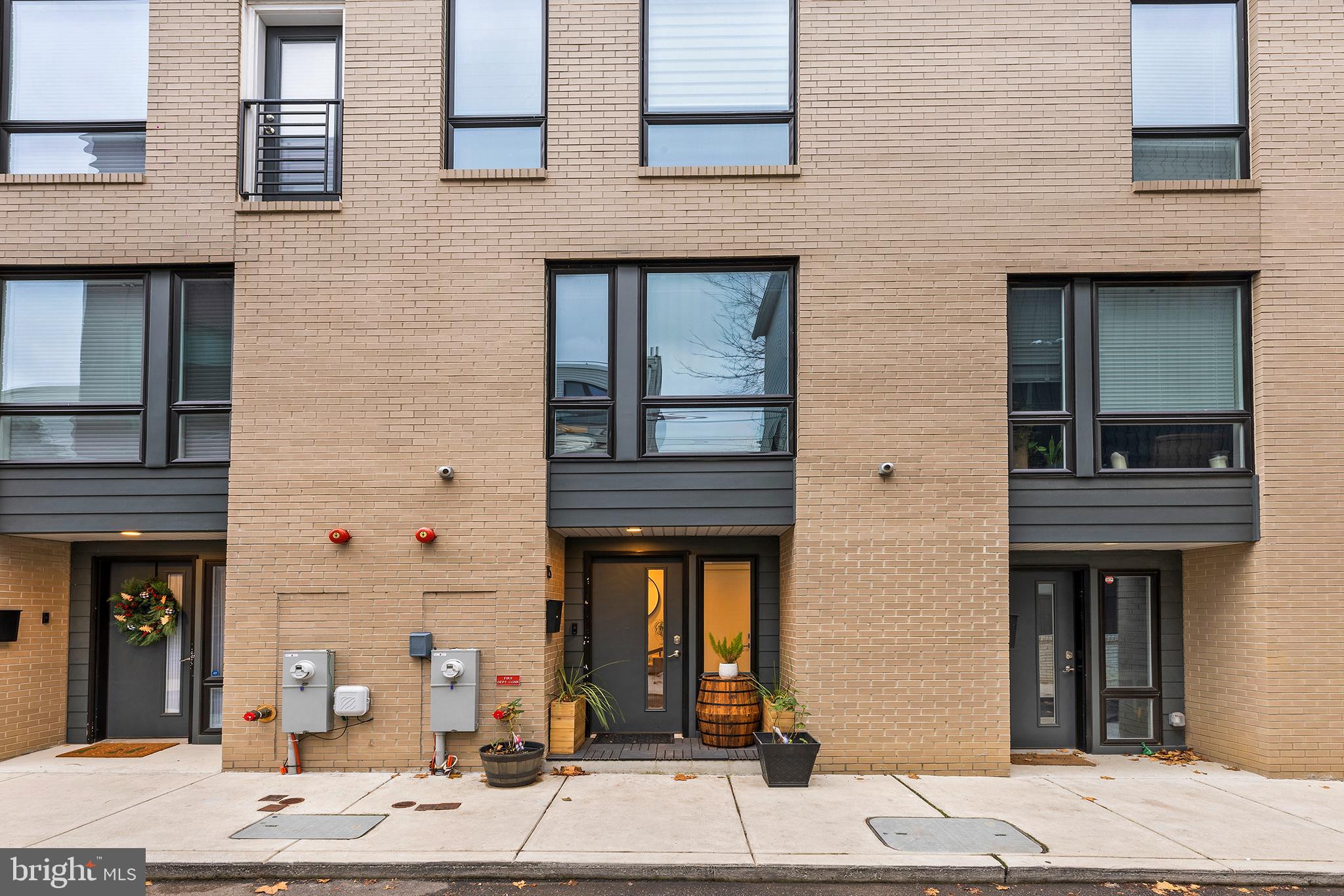 SHOWINGS AT OPEN HOUSE SATURDAY May 31st from 12:00-2:00 PM! Welcome to 815 Perkiomen St #15! Dare we say the home that has EVERYTHING?! Just imagine ... garage parking, two outdoor spaces, modern finishes, skyline views and an incredible location! Located in the heart of Francisville/Fairmount, Perkiomen St is perfectly situated just blocks from the best shops and restaurants Fairmount Ave has to offer as well as the newly completed Francisville Playground and minutes from Fairmount Park and the Schuylkill river. Pull right in to your private one car garage and enter the stylish foyer with full coat closet and half bath for convenience. Heading upstairs to the main living level, one is immediately struck by the hardwood flooring and abundance of natural light flooding in from either side. The open concept kitchen provides the ideal space for the chef of the house. Upgraded stainless steel appliances, designer cabinetry and expansive white quartz waterfall island creates a useful but stylish space. Finishing off this level is a quaint balcony off of the kitchen. Making ones way up the floating stairs, the next level has two generous bedrooms with built-in closet systems and a stylishly tiled full bath. The primary suite level is the perfect getaway with a large main room, fully built-in walk in closet, attached bath with expansive glass shower and dual sinks. Lastly, the roof deck provides unobstructed, jaw dropping skyline views as well as a built-in gas grill and comfortable sectional furniture! If you're looking for garage parking, two outdoor spaces, modern finishes, skyline views and an incredible location 815 Perkiomen St #15 is a must see! Home is available July 1st, 2025.