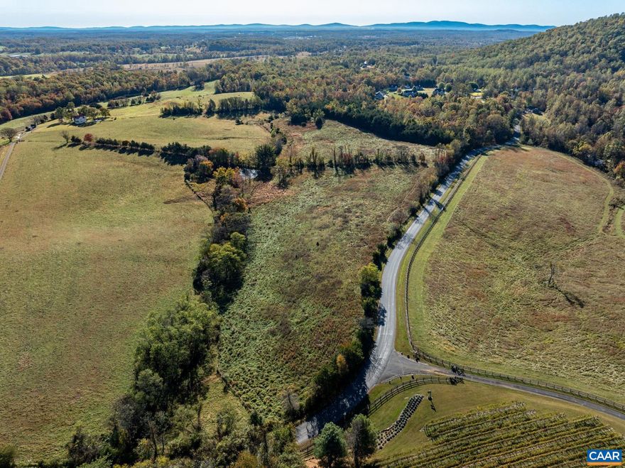 Nestled in the heart of the coveted South River Valley, this remarkable 55-acre parcel boasts breathtaking views of the Blue Ridge Mountains from multiple potential home sites. With 30 acres of open pastures and 25 acres of serene woodland, the land offers a harmonious blend of natural beauty and agricultural potential. A rare opportunity in an area celebrated for its preserved farmland and sweeping vistas, this property is ideally suited for a conservation easement and includes 18 valuable division rights. Whether you're envisioning a private estate, a legacy farm, or a thoughtfully planned development, this land provides the canvas for something truly special. Property last surveyed in 2016. Check out the video tour!