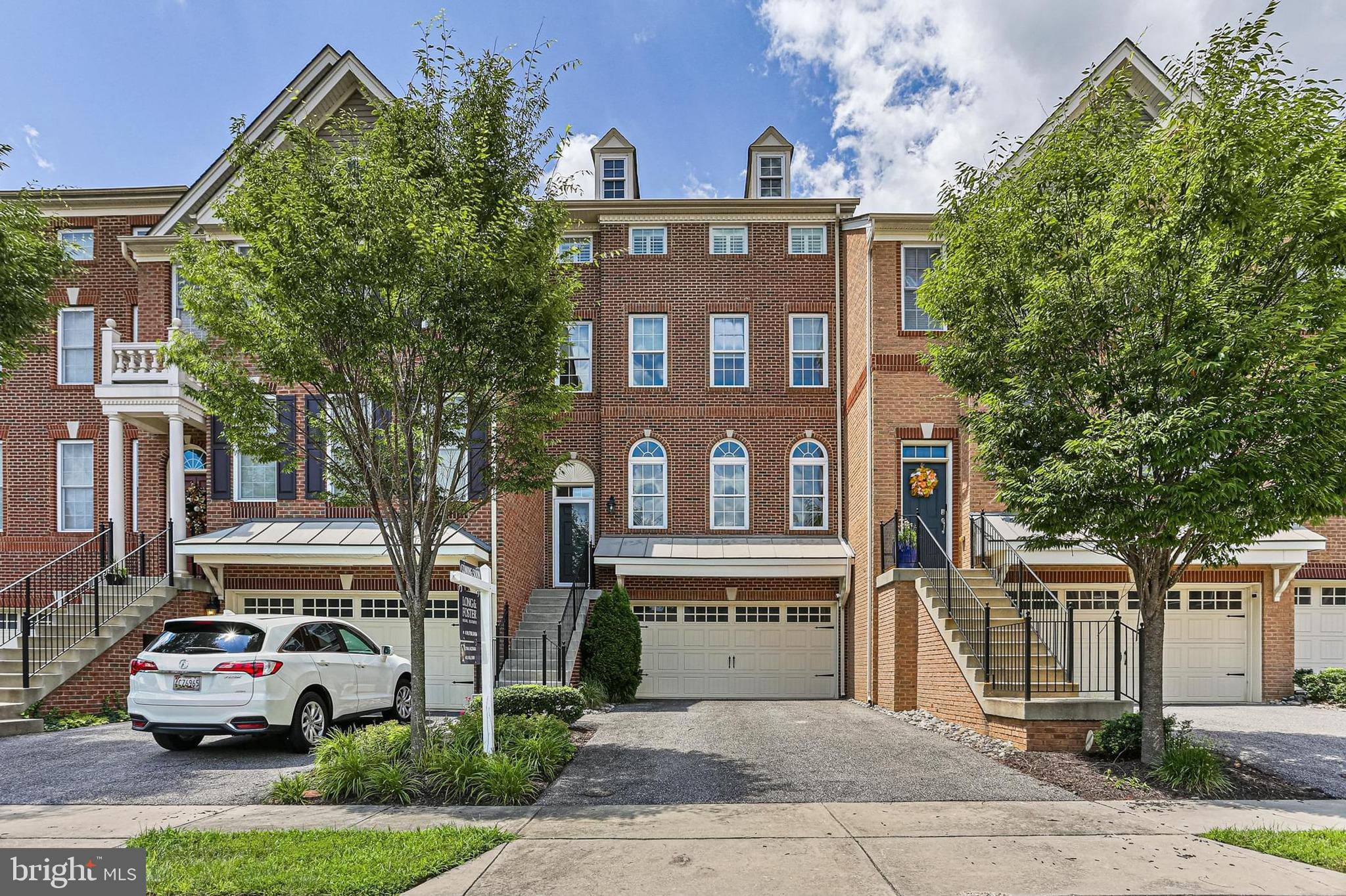 Discover Your Dream Lifestyle at "The Bradley Carolina" in Arundel Forest!
Welcome to this meticulously maintained, one-owner "Bradley Carolina" townhome by Toll Brothers, where luxury meets convenience in Severn, Maryland. Boasting 3 bedrooms, 2 full baths, and 2 half baths, this home offers an exceptional living experience with a 2-car garage.
Step inside and be greeted by gleaming hardwood floors throughout the main level, leading you through an inviting living room, elegant dining room, and a gourmet eat-in kitchen. The heart of this home shines with a large island, sophisticated chocolate cabinetry, exquisite granite countertops, and a custom backsplash – perfect for culinary adventures and effortless entertaining. A finished lower level with a half bath provides versatile space for a media room, home office, or gym.
Upstairs, unwind in your generous primary suite, featuring dual walk-in closets and a spa-inspired ensuite bath complete with a soaking tub, oversized shower, and dual vanities – your private sanctuary. Two additional ample-sized bedrooms, a full bath, and a convenient upstairs laundry room complete this level.
Outdoor living is a dream with multiple entertaining spaces. Ascend to the top-floor loft, where a sliding glass door opens to a private balcony – ideal for stargazing with your favorite beverage. Downstairs, just off the kitchen, a charming brick paver patio in the backyard awaits your next BBQ.
Reside in the highly sought-after, amenity-rich Arundel Forest community, offering a clubhouse, fitness center, resort-style pool, tot lots, playgrounds, and scenic walking trails. This isn't just a home; it's a staycation way of life!
Enjoy unparalleled convenience with major employers and attractions mere minutes away: Ft Meade (1.5 mi), Northrop Grumman (6 mi), Arundel Mills Mall (4 mi), Univ. of MD B/W Medical Center (8.5 mi), Marc Train (7 mi), and easy access to Washington D.C. (27 mi).