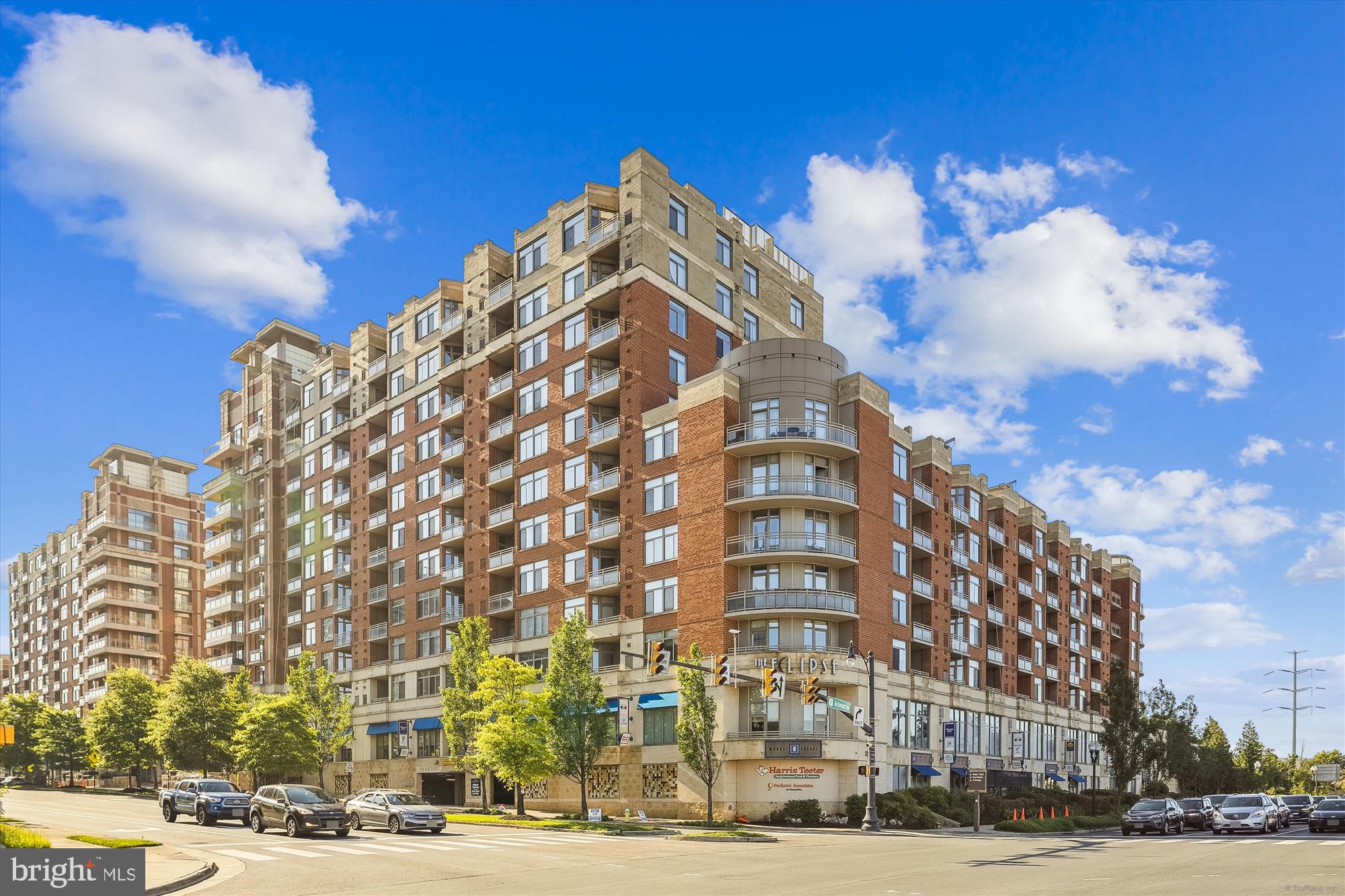 Welcome to The Eclipse on Center Park—one of Arlington’s most sought-after full-service condo communities! This rarely available two-bedroom, two-bath corner unit offers an expansive floor plan, floor-to-ceiling windows, wood flooring, and a massive wraparound terrace—perfect for dining al fresco, relaxing after work, or entertaining under the stars.
The open-concept kitchen features granite countertops, stainless steel appliances, ample cabinet space, and a breakfast bar that flows into the spacious living and dining areas. Each bedroom offers generous space and privacy—ideal for roommates, guests, or a home office setup. The primary suite includes a walk-in closet and en-suite bath, while the second full bath is accessible from the main living area and second bedroom. Full-size washer and dryer in unit, and garage parking is included!
Enjoy unbeatable views overlooking Four Mile Run, lush courtyards, and the cityscape of Alexandria and the Potomac River beyond. Building amenities include a 24-hour concierge, fitness center, outdoor pool, rooftop terraces, theater room, party room, and more.
Walk downstairs to Harris Teeter, or take a short stroll to restaurants, salons, coffee shops, and nearby parks. Commuters will love easy access to Metro bus routes, Route 1, I-395, and proximity to Amazon HQ2, Crystal City, the Pentagon, and Potomac Yard Metro (now open!).
This is urban living with space to breathe—schedule your showing today!
$0 Security Deposit Option for Qualified Residents!
See resident brochure or property manager website for more details.