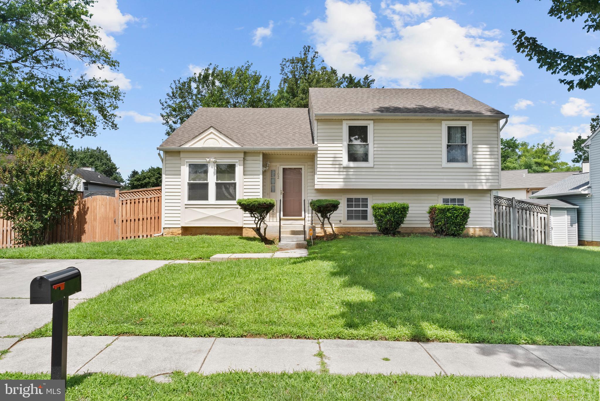 Welcome to the perfect opportunity to purchase your home in beautiful Gwynn Oak! This inviting single-family residence offers over 1,900 sqft of comfortable living space and is perfect for anyone looking for both style and practicality. Step inside and immediately feel at home in the family room, filled with natural light, creating a warm and inviting atmosphere. On the upper level you will find the kitchen featuring brand new flooring, a new refrigerator, stove, and dishwasher. Host dinner parties under the glow of a the chandelier in the dining room. From here, step out onto the rear deck for to enjoy the serene backyard views. This home boasts three generously sized bedrooms, including the primary suite, offering plenty of closet space and natural light. There are endless possibilities with a spacious unfinished basement. Whether you envision a playroom, home gym, or additional living area, this space offers potential and includes convenient walk-out access to the backyard. The fully fenced-in yard ensures privacy and safety, making it ideal for children and / or pets to play freely. With a dedicated driveway and plenty of street parking, convenience is always at your doorstep. Schedule your appointment today to make the dream of owning this home a reality!
