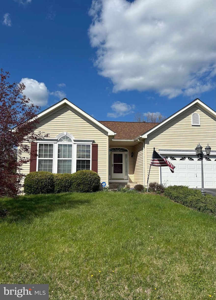 Enter the spacious, open floorplan with 3 bedrooms on the main floor.  Hardwood floors abound in Family Room, generous kitchen with pantry, dining room and bedroom.  The family room has a cozy gas fireplace and adjoins the open floorplan kitchen.  The owner’s bedroom has a large walk-in closet with a master bath that is equipped with grab bars for handicap assistance.  Appreciate the walk-in shower that has a seat, along with the double sink vanity.  The oversized laundry room has built in cabinets, additional pantry space, and built utility sink.  A broom closet gives ample storage for vacuum cleaners and mops.  The walkout, daylight basement has a double French door that allows easy access to storage and workshop space in the pristine basement.  Another utility sink helps with cleanup and shelving abounds.  There is a rough in for a future bath.  Your imagination can give you a spacious lower level.  Enjoy the quiet lifestyle on a lovely golf course.  This outstanding home backs to wooded privacy on a large .59 acre premium homesite.  No golf balls or golfers will disturb your peaceful appreciation on your screened in porch.  Multiple locations with the auxiliary deck or the concrete patio gives ample space for outdoor barbecuing or outdoor dining.  Outside storage allows the garage to remain free of mowers and snowblowers.  The double car garage has an epoxied floor and a utility sink with water spickets for ease of car washing.  The seller had the garage dry walled and insulated to make the garage weather resistant.  Convenient side door allows for easy entry.  Garage doors make it easy to park your vehicles.  The roof has been installed in the last few years and an upgraded, brick mailbox completes this package.  Seller lovingly maintained this home.  Schedule your appt for viewing.  Enjoy the community pool, ponds and small lakes, and tennis courts.