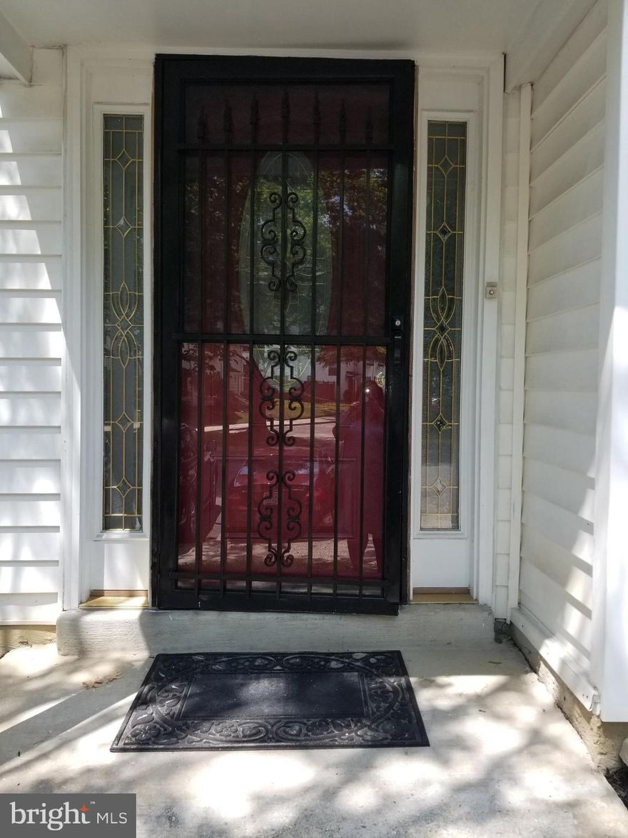 LOCATION IS KEY in this sought-after area of Kettering.  This beautiful, End-Unit home features 2 full master bedrooms...each with its own private full sized tiled floor bathroom.  Beautiful Hardwood Foyer, steps, and hallway.  It is clear this home has been well maintained inside and out.  The Upgraded Powder Room on the Main Level is perfect for guests. The natural light filled living room shows off a fire place with a mantle.  The living room opens up to a modern Dining Room with Chair railing, decorative accents and Upgraded lighting.  The front door is beautifully adorned and adds to the floods of natural light flowing throughout.  Brand New Roof, New Furnace and Water Heater. Stacked Washer/Dryer, Ceiling Fans, Private Fenced in landscaped patio boasts plenty of room for gardening, grilling, relaxing and entertaining!  Close proximity to Prince Georges Community College, Six Flags, Watkins Park, Woodmore, Largo Metro Station, The New University Maryland hospital and Childrens Prince Georges Clinic, restaurants, grocery stores, and much more.  Why are you still reading...Click Now ...This Wont LAST!!!  Call today to schedule your private showing!