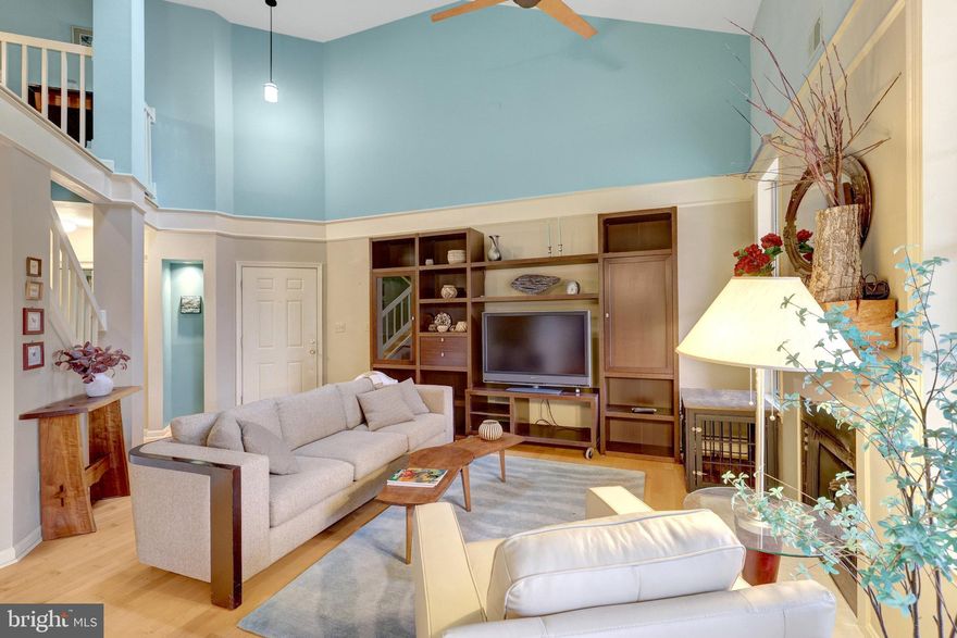 $10,000 Seller Credit — Your Way!
Take advantage of an exceptional opportunity with a $10,000 seller credit that puts you in control. Use it to pay off the full special assessment, offset closing costs, buy down your interest rate, or apply it however best supports your purchase. This flexible incentive makes homeownership more affordable and allows you to customize the benefit to fit your needs. A rare and valuable advantage—don’t miss it!

Reston living at its best in this spectacular, light-filled 2-level loft-style condo in highly sought-after North Reston! One of the largest models in the community, this impressive 2BR/2.5BA home offers 1,540 sq. ft. of airy, open living space, enhanced by soaring vaulted ceilings, Wall of windows, and treetop views.

Step inside to a stunning Great Room featuring gleaming maple engineered hardwood floors, a cozy gas fireplace, with a new hearth, and an amazing balcony. The elegant dining area flows seamlessly into a beautiful kitchen complete with stainless steel appliances, lovely cabinetry, a lighted backsplash, generous counter space, and a convenient breakfast bar.

Carrier Furnace (2022), Carrier AC Coil (2022), and Hot Water Heater (2022).

The extra large balcony offers beautiful views and outdoor space to relax.
The powder room near the foyer is convenient as is the laundry closet.
There is also a lighted art space.

The main-level primary suite is very large with plush new carpet, a spacious walk-in closet, and a large bathroom with water closet and tub/shower combination.

Upstairs, the expansive open loft makes the perfect home office, reading/tv room, or family room with views to the first level. The second level also features a large guest bedroom with vaulted ceiling, an oversized walk-in closet, and full bath creating a private oasis for guests.

The  North Reston location—is easy access  to North Point Village shopping center, Reston Town Center, all Reston community pools/trails/lakes and more. The location offers convenient bus service, the Wiehle-Reston East Metro and RTC Metro station, RT. 7, close to Dulles Airport. 

A rare combination of space, style, privacy, and location—welcome home!