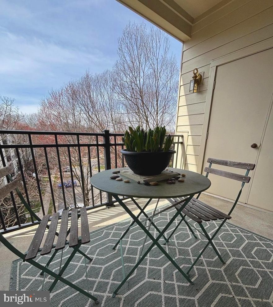 Spring Views are Here-  Beautiful & Large Balcony!

Reston living at its best in this spectacular, light-filled 2-level loft-style condo in highly sought-after North Reston! One of the largest models in the community, this impressive 2BR/2.5BA home offers 1,540 sq. ft. of airy, open living space, enhanced by soaring vaulted ceilings, Wall of windows, and treetop views.

Step inside to a stunning Living Room featuring gleaming maple engineered hardwood floors, a cozy gas fireplace, with a new hearth, and an amazing balcony. The elegant dining area flows seamlessly into a beautiful kitchen complete with stainless steel appliances, lovely cabinetry, a lighted backsplash, generous counter space, and a convenient breakfast bar.

Carrier Furnace (2022), Carrier AC Coil (2022), and Hot Water Heater (2022).

The extra large balcony offers beautiful views and outdoor space to relax. The powder room near the foyer is convenient as is the laundry closet. There is also a lighted art space.

The main-level primary suite is very large with plush new carpet, a spacious walk-in closet, and a large bathroom with water closet and tub/shower combination.

Upstairs, the expansive open loft makes the perfect home office, reading/tv room, or family room with views to the first level. The second level also features a large guest bedroom with vaulted ceiling, an oversized walk-in closet, and full bath creating a private oasis for guests.

The  North Reston location—is easy access  to North Point Village shopping center, Reston Town Center, all Reston community pools/trails/lakes and more. The location offers convenient bus service, the Wiehle-Reston East Metro and RTC Metro station, RT. 7, close to Dulles Airport. 

A rare combination of space, style, privacy, and location—welcome home!