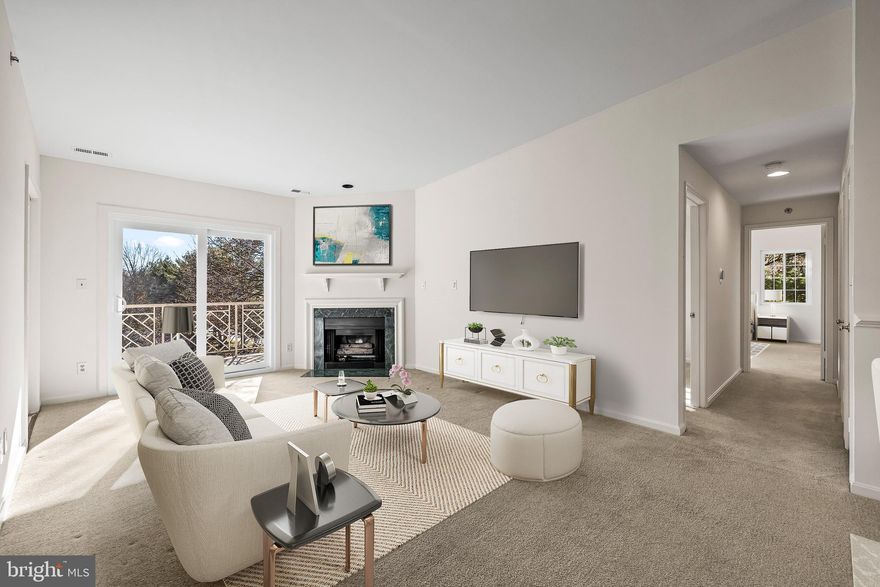 Light filled and move-in ready, this top floor Mays Chapel condo offers two bedrooms and two full baths with vaulted ceilings and a cozy gas fireplace.  The neutral interior features fresh paint, carpeting and a bright kitchen with granite countertops and appliances replaced in 2018. Windows, sliding door and kitchen door were also replaced in 2018, and the condo roof was replaced in 2019. Enjoy the convenience of a secure building and the peace of mind that comes with recent updates! Scheduled today! $500 move in fee to be paid at closing by Buyer.