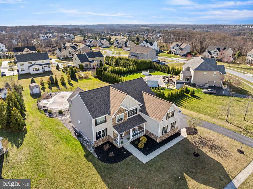 Stunning Luxury Living at 1212 Polo Run Drive in the bucolic rolling hills of West Bradford, PA! Welcome to your dream home!  This exquisite property boasts 5 spacious bedrooms and 5 full baths, perfectly designed for comfort and elegance, located in the prestigious Chestnut Ridge Estates Community!  Situated in the highly sought-after Downingtown School District and home of the S.T.E.M Academy.
As you approach the front walkway, you are immediately "wowed"  by the amazing curb appeal, featuring newer James Hardy siding and real stone exterior at the front facade of the home. Through the front door, you are greeted by a grand foyer that leads to an open-concept living area where natural light flows through large windows, highlighting the beautiful finishes. You will immediately notice the gleaming hardwoods. This area is flanked with a formal living room on one side and a spacious dining room on the other, featuring a newer finished Butler's pantry with 2 wine/beverage fridges perfect for large holiday gatherings. Moving forward, you will find a first-floor bedroom, which can also be used as an office or study, and right outside of that room, a full bath. Strolling along you will find a grand Great Room with soaring ceilings and a gas fireplace, perfect for gatherings. Next, the gourmet kitchen is a chef’s delight, featuring modern stainless appliances, loads of cabinets, granite countertops, and a large island, perfect for gatherings. Also located in this area is a large breakfast room, expansive pantry and tucked in the back, your separate laundry room. 
Moving upstairs, you will find the 2-door primary bedroom suite with sitting area, 2 spacious walk-in closets and a luxurious bathroom suite, perfect for a spa-like experience. There are also 3 other generously sized bedrooms on this floor, a loft-like playroom area and a full bath. One of the larger bedrooms also has an ensuite full bath with a shower and 2 larger walk-in closets.  The 1100 sq ft. fully finished walk-out basement is a true highlight, complete with a second kitchen area for entertaining, built-in ceiling speakers, a full bathroom, a dedicated exercise room for fitness enthusiasts, and a temperature-controlled wine cellar for connoisseurs. This versatile space can be tailored to your lifestyle, whether for relaxation or entertaining. The sellers have spared no expense, creating the opportunity for an amazing experience right here at home! Finally, step outside to your private oasis! Enjoy the in-ground heated pool and hot tub surrounded by a stunning paver patio, ideal for entertaining family and friends. The expansive deck provides plenty of room for entertaining guests or just a quiet tranquil area ideal for a little peace and quiet.
Additional features include a 3-car garage for ample parking and storage, beautifully landscaped grounds, newer roof in 2018, newer hvac (1 of 2), water softener, newer slider doors, expansive shed, whole house professionally painted, extended pavers for patio and driveway extension. A full detailed list of highlights has been provided, or see agent. If you are looking for something fun to do, enjoy the community park-like setting, featuring a tot lot with slides and swings, basketball court, baseball fields, and large walking/running/biking/dog walking trail.
This home is conveniently located in West Bradford Township.  It is within 5 minutes of the Thorndale train station.  If commuting by car, you'll find easy access to routes 322, 30, 202 and the Pennsylvania Turnpike. 
Don't miss this opportunity!  Schedule your private tour today and experience the elegance of 1212 Polo Run Drive!