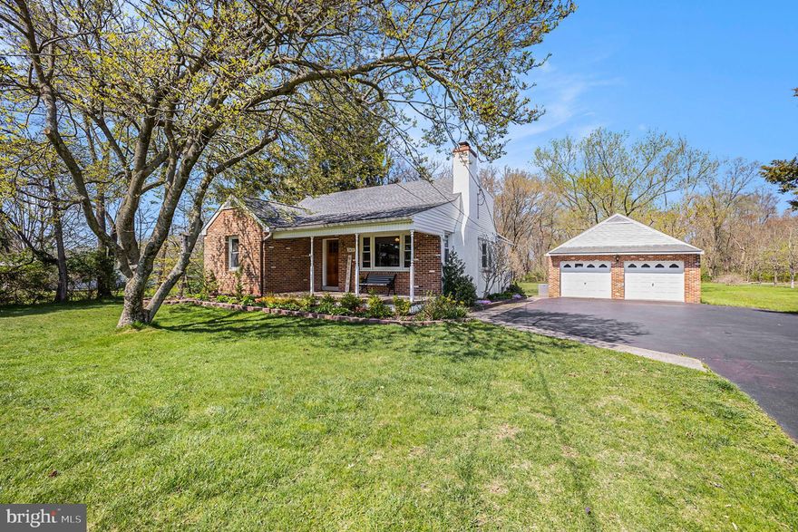 Welcome to your personal paradise!  Nestled on nearly an entire acre lot with mature shade trees, this beautifully maintained and upgraded brick Cape home has so much to offer.  The front porch is perfect for relaxing with a cup of coffee.  A beautiful Craftsman style front door leads into a light filled living room  with plenty of windows, a wood burning fireplace with tiled hearth, brick surround and wood mantle, ceiling fan, 2 deep coat closets with louvered doors and the mounted TV stays.  Original hardwood floors extend into the dining room with a bay window, ceiling fan and crown molding.  Everyone will love the updated and spacious kitchen with so many beautiful upgrades!  There are 42" alder wood cabinetry with crown, undercabinet lighting, oil rubbed bronze hardware, glass front doors and granite  counters.  A double stainless steel sink with gooseneck faucet is situated under the window.  There is ceramic tile flooring, breakfast bar with pendant lighting overlooking the family room, a deep pantry and vaulted ceiling with 2 skylights, ceiling fan and recessed lighting.  Appliances include a Frigidaire dishwasher, GE Spectra electric range, Whirlpool built-in microwave and Kenmore French door refrigerator.  Hardwood stairs accented with wrought iron balusters lead to the spacious family room with TWO triple windows, a closet and storage under the stairs, vaulted ceiling with wood beam, recessed lighting and ceiling fan.  French doors open to the patio and enormous back yard come complete with sand box and swing set!  On the main level is the owner's suite that has a spacious light filled bedroom with hardwood floors, ceiling fan, built-in bookcase and closet.  Your private bath has tiled floors, vanity with granite counter, tiled walk-in shower with glass doors, water closet with a pocket door and an enormous walk-in closet with recessed lighting.  This level has a second bedroom with ceiling fan, double closet and built-in bookcase as well as a powder room with tiled floors.  Continue upstairs to 2 additional bedrooms with carpet and lighted storage under the eaves that share a full bath with large vanity and tub with shower surround.  The upper level hall has a linen closet.  Bedroom 3 has a walk-in closet and built-in bookcase.  The basement is waiting for your design.  It already has Bilco doors and has been water proofed with a French drain.  There is a large storage area as well as laundry with utility sink.  Create a rec room with the rest of the space - there is a wood burning stove (seller has not used).  So much has been done to make this home ready for you:  NEW roof with 50 year architectural shingles (2019), New oil tank (2022), double hung windows, whole house water softener, Columbia oil heater and the list goes on! The 2 car garage has an entire upper level for storage and there is a storage shed in the yard.  What a great location! Methacton School District, close to shopping and entertainment and the Moran Trail is steps from the back yard connecting you to Evansburg State Park.  A one year AHS Home Warranty is included. Hurry to see this wonderful home!