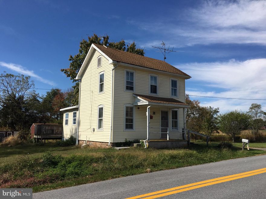 Farmhouse with 2.15 acres partitioned off with a pasture and three outbuildings.  Property needs updating, but has newer siding and roof plus a family room addition with vaulted ceiling and deck.  Eat-in kitchen, small living room and laundry on main level.  Upstairs is large bedroom, 2nd bedroom accessed through the larger and full bath.  Walk-up attic.  Unfinished basement.  AS IS sale, no FHA/VA offers, only cash or strong conventional.  Inspections for info only.