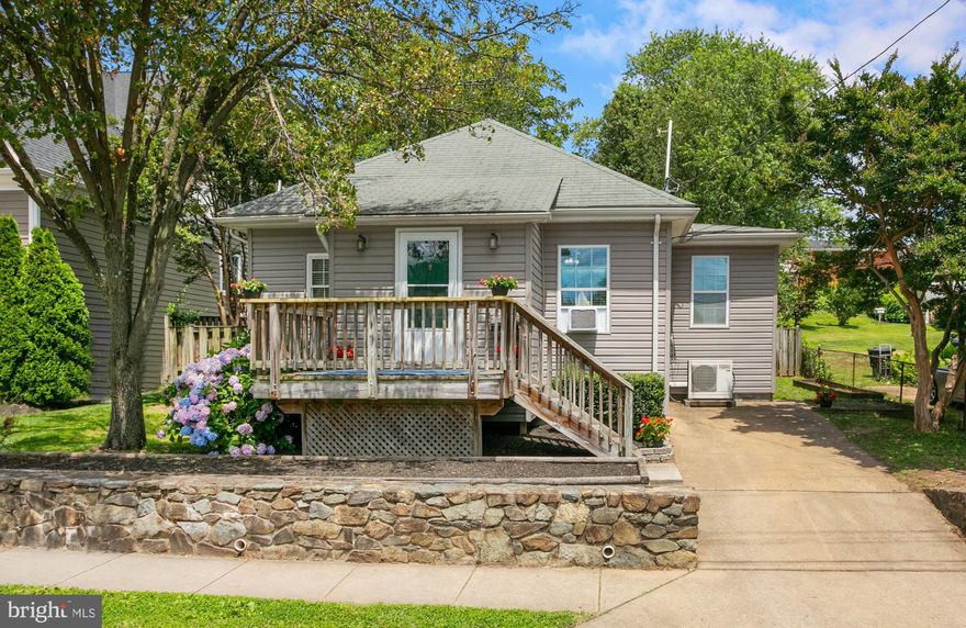 *** Open Saturday, 8/21, 1-3pm *** North Arlington bungalow full of charm and history on large .17ac lot.  In 1953, this house was moved from 1149 N. Glebe Road to where it sits today.  Enjoy the renovated kitchen with stainless appliances, granite countertops, breakfast bar, exposed brick, and gas cooking.  Kitchen opens into roomy dining area which flows into the sunny living room.  Mudroom entry offers built-in cubbies and plenty of organized storage. *** Primary bedroom has cooling ceiling fan, wood blinds, multiple closets, including a walk-in, all with shelving systems in place.  En suite primary bath is beautifully updated and feels like a spa!  Contemporary open-style vanity compliments the sleek glass countertop and sink.  With designer wall tile, river pebble floor, wall nook and frameless glass surround, this shower with wall unit is amazing!  A second bedroom, full bathroom, and wood blinds and hardwood floors throughout complete the main level.  *** Head upstairs to the third bedroom with additional storage and cedar-lined closet.  This space would also make for a great office, guest room or whatever you may need. *** Spacious backyard offers a full-length deck and morning sun. Yard has been graded to allow for maximum use, including a huge shed and garden area on upper level. The shed is large enough to store all your garden tools and lawn equipment with plenty of room left to work inside. Built-ins and rolling storage shelves will help you keep organized. Second shed is great storage for bikes, and other outdoor or sporting equipment.  *** Every consideration towards maximizing space was taken with this home! New gas range and window AC units. Fresh paint in many rooms, and updated front-loading washer and dryer in the basement. New vapor barrier installed in basement.