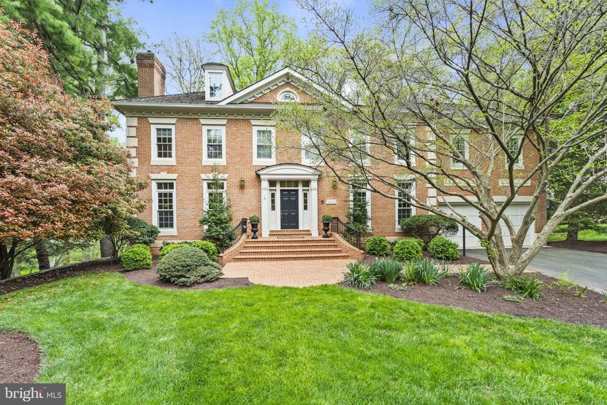 Absolutely one of my very favorite models in the estate section, Eagle Ridge at Avenel, this coveted Mitchell, Best & Visnic "Ridgemoor" model has high ceilings, generously proportioned room sizes and one of the best floor plans available - perfect for family gatherings or large scale entertaining with guests.  This handsome, red brick Georgian colonial will surprise you inside with a wonderful feeling of space and excellent natural light.  The stunning two story marble entry Foyer welcomes you.  A private fully paneled home office awaits with a wall of built-in bookcases and cabinets - perfect for those working from home.  The formal Living Room with floor-to-ceiling clerestory windows, a marble fireplace and thick crown moldings opens to a truly fabulous perfectly proportioned, welcoming Dining Room  also with floor-to-ceiling clerestory windows, thick crown moldings and a beautiful bay window overlooking the backyard.   The hub of the home - the Chef's Kitchen is open to the dramatic two story Family Room with walls of windows, a wood burning fireplace and a back staircase leading to the secondary bedrooms.  The Gourmet Kitchen offers warm wood cabinets with loads of storage along with corian counters and a big center island with a prep sink.  For those who love to cook and bake, you will LOVE this Kitchen!  A big bay window at the kitchen sink offers serene views of the backyard and the deck.    The Upper Level is comprised of a sumptuous Primary Suite, double walk-in closets, a huge Primary Bath with a separate shower and soaking tub and double vanities and access to a private sitting/hobby/exercise room that could be a potential 5th bedroom.  Three other big bedrooms, one with an en suite bath and two with a buddy bath, completes the Upper Level.  The Lower Level is dynamite with a huge, daylight, walk-out Recreation Room with a stunning floor-to-ceiling stone fireplace.  There's an Au Pair Suite/5th Bedroom/Guest Bedroom with an En Suite bath and an Exercise Room with it's own Full Bath open accessible to the Recreation Room.  A huge storage/utility room with space for a workshop finishes off the Lower Level.  Sited in a private wooded enclave, backing to the 11th hole of the TPC Avenel Golf Course, the Eagle Ridge at Avenel location can't be beat with easy access to the Clara Barton Parkway, I-495, the Beltway and the I-270 BioMed Corridor.  Local area airports, Dulles International and Reagan National Airports, are less than a half hour drive away, non-rush hour.  Enjoy the cultural opportunities in downtown DC. Great Falls National Park is nearby offering outdoor adventure on the Billy Goat Trail, the Gold Mine hiking trails, kayaking on the Potomac River or cycling into Georgetown or onto the Capital Crescent Trail.  Avenel is one of the nation's finest communities providing neighborhood security, full lawn maintenance for easy living, a local swim/tennis club, a 30 acre park with soccer fields, a baseball diamond and tot lot.  All this in addition to top ranked schools in the area and nationwide - Carderock Elementary, Pyle Middle School and Walt Whitman High School.  This is the home you have been waiting for... don't hesitate, you'll love the Avenel way of life!