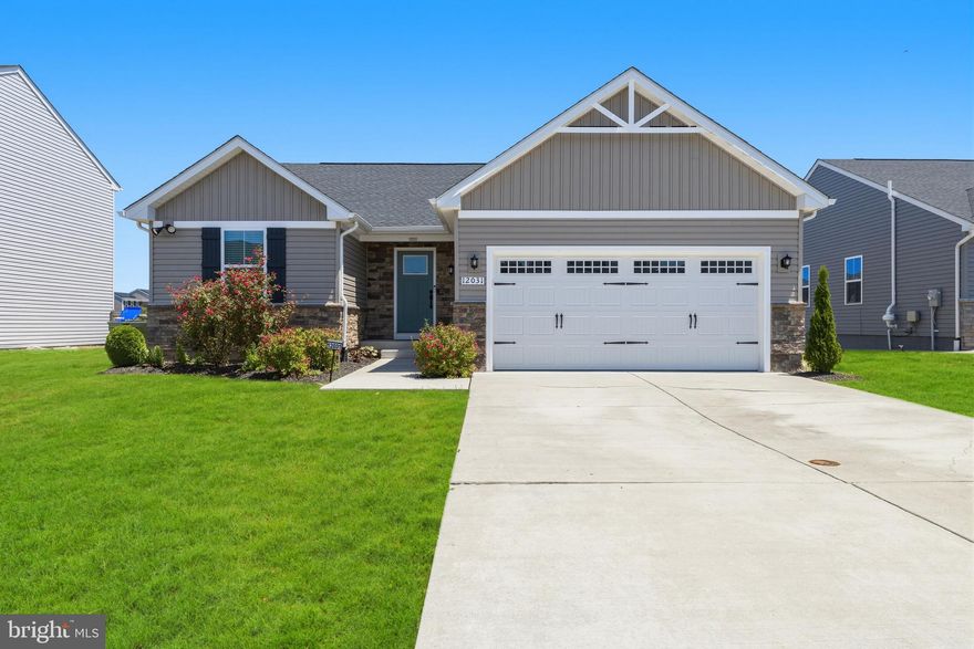 Welcome to this beautifully designed 2022 craftsman-style rancher located in the  sought-after Hopyard Farm community. Offering modern construction, comfortable main-level living, and exceptional finished space, this home blends style, function, and convenience.
The main level features 3 bedrooms and 2 full baths, thoughtfully designed for easy one-level living. A bright open floor plan creates a seamless flow between the living, dining, and kitchen areas—perfect for everyday living and entertaining. The kitchen overlooks the main living space and opens to a low-maintenance Trex deck, ideal for relaxing outdoors or hosting gatherings.
The beautifully fully finished basement adds tremendous additional living space, featuring a 4th bedroom, full bath, spacious recreation area, and an additional flex room perfect for a home office, gym, or hobby space. This versatile lower level offers plenty of room for guests, work-from-home needs, or extended living space.
Residents of Hopyard Farm enjoy an impressive array of community amenities including a clubhouse, fitness center, resort-style swimming pool, tennis courts, playgrounds, walking trails, and access to the Rappahannock River, creating a lifestyle that blends recreation and relaxation.
The location is also ideal for commuters, situated approximately 20 minutes to Downtown Fredericksburg with its vibrant shops, restaurants, and historic charm, and about 20 minutes to Naval Surface Warfare Center Dahlgren Division, making it a convenient option for those working at Dahlgren or throughout the Fredericksburg region.
This nearly new home offers the perfect combination of modern construction, main-level living, flexible finished basement space, and a vibrant amenity-rich community—a fantastic opportunity in King George. Welcome Home!