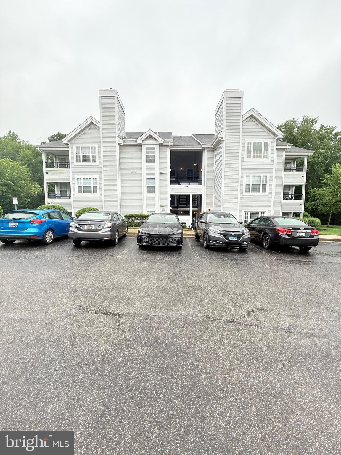 Excellently maintained ground level unit with 2 Bedrooms and 2 Full Bathrooms. New flooring throughout, extremely usable layout with master suite, walk in closet, large kitchen, stainless steel appliances, granite countertops, stone fireplace, stackable washer and dryer with a walk out back porch and community dog park. Conveniently located close to Rt32, 97, Telegraph Rd. and a short drive to Rt 3/ Waugh Chapel.