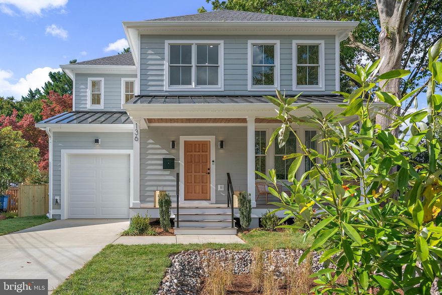 Brand-New in Homewood!  Perfect layout with a front sitting room or office, and a spacious family room that opens to an extra-large, flat backyard — fully fenced with a gorgeous Bluestone patio for entertaining, family parties, or games. Wide-plank wood floors, solid wood doors, high-end finishes, an electric fireplace, and a large walk-in mudroom pantry. Beautiful baths feature rain showerheads, and the covered front porch is made for relaxing. The finished basement adds a full bed and bath for guests or flex space. Easy access to Downtown Annapolis via the Homewood Walking Trail on Poplar or the Spa Creek Trail by Ceremony Coffee. Every detail, elevated!