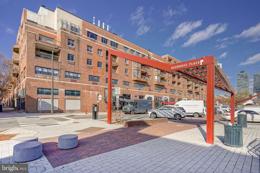 Nicely maintained 1-bed, 1-bath condo in desirable Abbott's Square located near Historic Society Hill with private balcony with direct views of Center City skyline.  This unit features hardwood floors throughout and offers a spacious living room which provides access to the private balcony, dining area, galley kitchen with an abundance of cabinets & counter space with ceramic tiled backsplash, newer appliances that includes electric range/oven, built-in microwave & dishwasher, refrigerator and stackable washer & dryer that are all included.  The remainder of the unit hosts a spacious bedroom with a walk-in closet, hall bath with shower/soaking tub combo with a fitted surround, newer vanity & toilet and hall closets.  Perfect location for all needs and just steps away from elevator.  All new Pella doors and windows installed in 2019 which was a $5,000 upgrade.   Abbotts Square is a wonderful building located in the Queen Village neighborhood of Philadelphia. There is a 24-hour concierge, fitness center and monthly parking available at the onsite and covered garage for $315 per month.  Situated in one of Philadelphia's most desirable neighborhoods, this condominium offers unparalleled convenience and a rare opportunity to experience elegant city living at its finest.  Explore the historic charm of Society Hill with its cobblestone streets, renowned restaurants, boutique shops and of course the wonderful farmers market at Headhouse Square every Saturday. Just steps away from Independence Hall, Penn's Landing, and the vibrant nightlife of South Street, you'll find endless opportunities for entertainment and recreation.