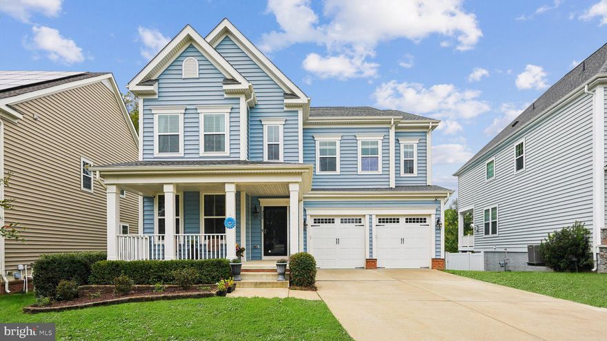 Welcome to your dream home in amenity-rich Embrey Mill. This beautifully maintained residence offers 5 bedrooms, 5 full baths, and over 4,500 finished square feet of stylish living across three fully finished levels, including a two-car front-loading garage. Situated on a rare private lot backing to serene wooded views, this home blends comfort, convenience, and luxury in one of North Stafford’s most desirable communities. From the inviting covered front porch, you are welcomed into a home designed for modern living. Inside, the main level boasts expansive engineered hardwood floors that add a touch of sophistication throughout. The flexible office or sitting room offers a versatile space to suit your needs—whether it's work or relaxation. The bright formal dining room, adorned with crown and chair molding, is perfect for hosting memorable dinners. The gourmet kitchen is truly a chef’s dream! With a butler’s pantry, granite counters, custom cabinetry with glass accents, and a chic stiletto-accented backsplash, this kitchen is as stylish as it is functional. The wall oven, gas cooktop, and large island with seating invite everything from cozy morning coffee to unforgettable dinner parties. The spacious eat-in area provides a casual spot for morning coffee or family breakfasts. Plus, enjoy easy access to the back composite deck, perfect for grilling and outdoor dining! This is an ideal setting for relaxing after a long day or hosting weekend cookouts while taking in the peaceful wooded views. The kitchen seamlessly flows into the open family room, and with its cozy gas fireplace, it makes entertaining a joy, creating a warm and welcoming ambiance. This level also includes a convenient main-level bedroom with a full bath, ideal for guests or anyone seeking easy accessibility. The practical mudroom combines style and function, with a coat closet and custom-built-in storage that keeps outerwear and shoes neatly organized. Beautiful wood steps lead to the upper level, where a versatile loft awaits—perfect for a playroom, office, or gaming area. From there, you’ll indulge in the spacious primary suite, featuring a tray ceiling, TWO walk-in closets, and a spa-inspired bath complete with a soaking tub, dual vanity, tiled shower, and private water closet. Three additional bedrooms elevate the upper level, including one with its own private en-suite bath and walk-in closet. Two more bedrooms are thoughtfully connected by a Jack-and-Jill bath featuring a dual vanity and a separate water closet. An upper-level laundry is perfect for everyday convenience. The walk-out lower level offers a spacious recreation room, full bath, and an additional room ideal for a sixth bedroom, office, or craft room. An adjacent large storage closet could easily be converted into a bedroom closet if desired. The unfinished portion of the basement also includes added shelving, providing even more convenient storage space. From this level, you can step outside to a patio that extends your outdoor living space and connects seamlessly to the backyard. The fully fenced yard with vinyl fencing, irrigation system, and storage shed combines convenience with charm. Additional highlights include a dual HVAC system (with one unit replaced in 2025) and a security alarm system for added peace of mind. Community amenities span 285 acres of open space, two pools, a community center, Grounds Bistro & Café, a dog park, multiple jogging/biking trails, playgrounds, an amphitheater, a community garden, and more! The Jeff Rouse Sports Center, with gym membership and indoor pools, is also just minutes away. Unbeatable location—walk to the community pool, café, and Publix at Embrey Mill Town Center. Minutes to I-95 express lanes, commuter lots, Stafford Hospital, restaurants, and shopping. Easy commute to Quantico and the FBI Academy. Don’t miss the 3D Matterport tour and this rare opportunity to own a spacious, upgraded home in sought-after Embrey Mill!