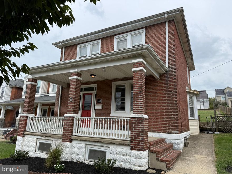 Lovely and recently updated 2-story, 3-bedroom brick Colonial in the heart of Conshohocken Borough! This home features a covered front porch perfect for relaxing rain or shine. The main level includes a bright living room with hardwood floors and decorative columns that open to a formal dining room with a bow window. The kitchen offers tall white shaker cabinets, a breakfast bar, gas range, dishwasher, and tile flooring, and connects to a convenient mud/laundry room with washer, dryer, utility sink, shelving, and access to the deck and fenced backyard. A main-level powder room adds convenience. The upper level includes an expanded primary bedroom with a large closet, two additional bedrooms, and a spacious full bathroom with tile flooring. The unfinished basement provides excellent storage space. The fenced rear yard features a large deck ideal for entertaining and a full-length sidewalk leading to the detached garage with its own electric meter. Excellent location within walking distance to parks, restaurants, public transportation, and major routes including the Turnpike and I-476. A great opportunity to live in sought-after Conshohocken!