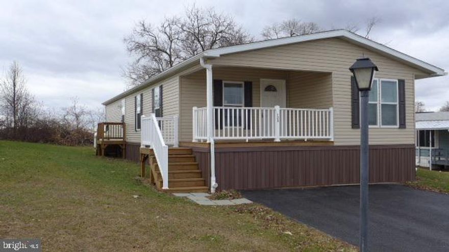 Brand new, never been owned dbl-wide!  Beautiful KIT w/ stainless appliances & pantry.  MSTR has His & Her WIC & full BA.  Thermo pane windows, ceiling fans & LAU room.  Great location w/ major shopping nearby.  The rear of the property backs up on farmland for a beautiful view.  Don't miss this one!
