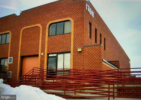 Photo of 7611 Rickenbacker Drive #26A, GAITHERSBURG, MD 20879 (MLS # MDMC2208658)