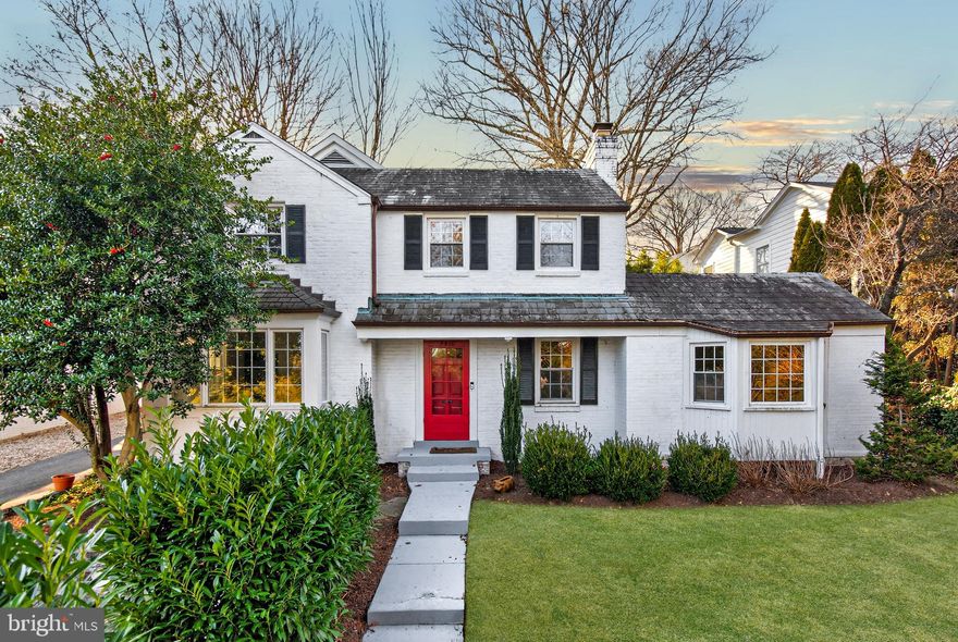 Stunning 4-bedroom, 3-bath single-family colonial nestled on an expansive 8600+ sq ft lot in the highly coveted Bradley Hills neighborhood, located within walking distance to Capital Crescent Trail which leads right into Bethesda Row. Designer finishes welcome you to this light-filled home featuring recessed lighting and hardwood floors throughout. The spacious chef’s kitchen boasts beautiful white cabinets, granite countertops, gas cooking, and a well-situated breakfast nook with butler’s pantry. Enjoy a quiet morning while savoring your morning coffee surrounded with ample natural light via large windows while taking in the peaceful views of the rear yard. This home is an entertainer’s dream- presenting an inviting living room with a wood-burning fireplace and added recessed lighting completed in 2020, a formal dining room with bay window and built-in cabinetry, and an impressive family room addition with direct access to an enclosed patio remodeled in 2022. The result is a seamless indoor and outdoor living experience designed to be enjoyed year-round. A nearby wet bar and full bathroom complete this level. When ready to unwind, retreat upstairs to the spacious owner’s suite, featuring a walk-in closet with an adjustable closet system and a fully renovated en-suite bath (2020) featuring a contemporary vanity and custom tiled walk-in shower. Down the hall are three additional generously sized bedrooms, each with ample closet space, and an updated full bath with tub/shower combo. The partially finished basement includes carpet, built-in shelving, and generous cabinetry, offering flexible space ideal for an in-home office, gym, or hobby area. The unfinished laundry and utility space features a new washer and dryer installed in 2023, an additional upright freezer (2022), and abundant storage options. Outdoor entertaining truly shines in the fully fenced rear yard, surrounded by mature trees for privacy and tranquility, and enhanced by a stone patio, retaining wall with boulder steps, and a thoughtfully landscaped backyard with a kids' playset. Host the perfect summer BBQ or enjoy an evening drink under the stars in this peaceful outdoor haven. No HOA, yet part of the South Bradley Hills Neighborhood Association, where frequent block parties and social events create a welcoming sense of community. Long driveway and freshly installed parking pad (2022) now offer off-street parking for up to 4 cars. Ideally located within one mile of Bethesda Row, this home offers easy access to popular dining and shopping destinations, and the Bethesda Metro (red line). A wonderful opportunity to enjoy life in the heart of Bethesda!