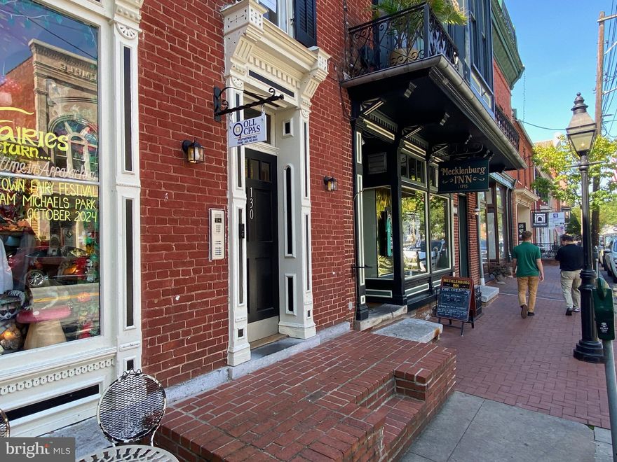 Offering a rare and unique opportunity to rent one of the nicest 2 bedroom apartments in down town Historic Shepherdstown.  A great place for the adult working professional.  130 East German, Suite 201:  2 BR, 1 BA, totally restored and like new, wood floors, exposed brick living room walls, like new stainless electric range, range hood, & fridge, large master bedroom with dual closets, smaller bedroom #2, spacious full bath, new hot water heater, multiple mini split units for heating/cooling with remotes.  Parking for 1 vehicle provided on site in rear parking lot.  A second parking permit would need to be negotiated as well as potential use of the Tesla Charging station.  Tenants are provided with a private code to front door buzzer/intercom system.  Heavy duty, coin operated, commercial washer and dryer provide in a well lit basement laundry common area.  24 hours noticed required prior to touring.  Credit and Criminal Background checks apply.   This is a pet free building so no pet inquiries please.  Applications can be made on the listing agencies website.  $40 application fee applies.  $1,400/mo. & $1,400 deposit & renter's insurance required.