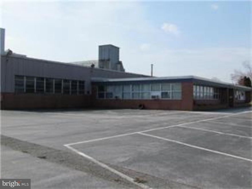 Main building is 59,078 SF (includes 3,900 SF of office space) with 4"-8" concrete floors & steel construction.  Second concrete building is 3,200 SF & 3rd building is 8,000 SF.  4 loading docs (3 10'x10' & 1 12'x12'), 8 on grade overhead doors, 3600 AMP/480V/3 -Phase electric, ceiling height ranges from 9' (in office) to 19'.  Gas fired heat, six bathrooms and a locker room & parking for 100+ cars - Zoned I-1 (Industrial) on 45.92 acres.