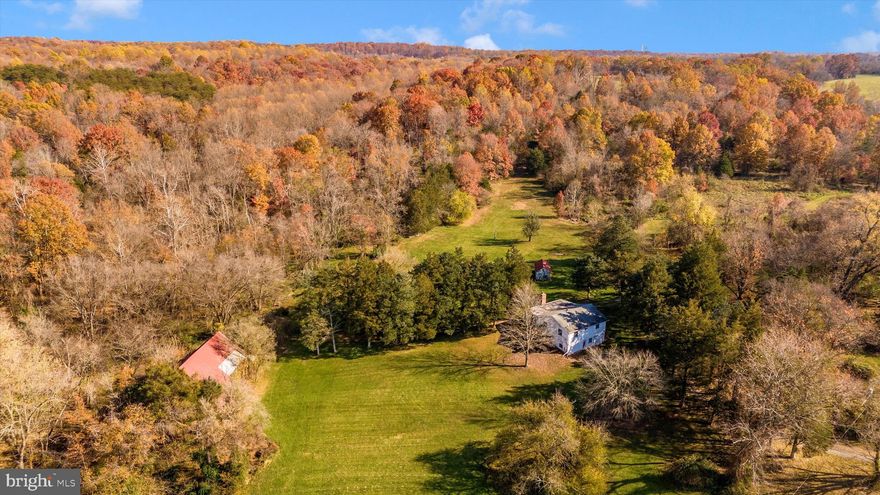 A beautiful farm and a rare find. This property offers the perfect blend of privacy and potential. Boasting 212 +/- acres, this expansive property enjoys a large forest and lush hay fields. Some call it a hunter's paradise, providing ample opportunities for outdoor enthusiasts. The property is improved with a charming cottage and outbuildings.  Embrace the serenity of the surroundings while envisioning the possibilities for creating a unique retreat. A true gem.