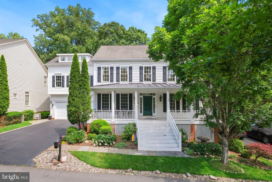 Tucked away near the end of Still Creek on a serene, private lot backing to Muddy Branch parkland, this exceptional home offers space, style, and versatility in the heart of the Lakelands. A true standout, the property includes a legally permitted, fully self-contained Accessory Dwelling Unit (ADU) above the garage—complete with its own kitchen, laundry, full bath, and a dramatic lofted bedroom and office space. Whether used as a guest suite, home office, private retreat for older children, or a lucrative rental unit, this soundproof space—with both private and interior access—adds incredible value and flexibility.

Inside the main residence, thoughtful updates and architectural details elevate every room. The inviting front porch opens to a bright, spacious layout featuring newly installed hardwood stairs and second-floor flooring. The gourmet kitchen is a chef’s dream, boasting granite countertops, a Boos Block island, stainless steel appliances, an oversized GE Monogram wall oven with warming drawer, convection microwave, and custom backsplash. Enjoy casual meals in the sunlit breakfast nook overlooking the expansive deck and backyard oasis.

Adjacent to the kitchen, the family room features hardwood floors and a cozy stone fireplace, creating the perfect gathering space. Formal living and dining rooms, a granite-topped butler’s pantry, powder room, and a generous laundry/mudroom with storage and utility sink complete the main level. The attached garage and private driveway provide plenty of practical convenience.

Upstairs, the primary suite is a true retreat with tray ceilings, double-door entry, a walk-in closet, and a spa-like en suite bathroom with soaking tub, glass-enclosed shower, and designer finishes. Three additional bedrooms, all with ceiling fans, share a well-appointed hall bath with ample linen storage.

The walk-out lower level is an entertainer’s dream, featuring a large recreation and game room, a full wet bar with entertainment island, a renovated full bath with sauna, a hidden workshop room, and a true home theater with a 120" projector screen and surround sound. A bonus room offers even more space for guests, a gym, or hobbies.

Outside, the fully fenced backyard is a peaceful escape with a large deck (gas line ready for grilling), a stone pathway, and a charming garden gate overlooking the Muddy Branch Trails with a nearby path to the trail. Whether you're hosting, relaxing, or exploring nature, this home provides endless opportunities.

Located in one of the area’s most desirable neighborhoods, with easy access to Lakelands’ shops, restaurants, and community amenities, this one-of-a-kind property is the perfect blend of luxury, comfort, and convenience.