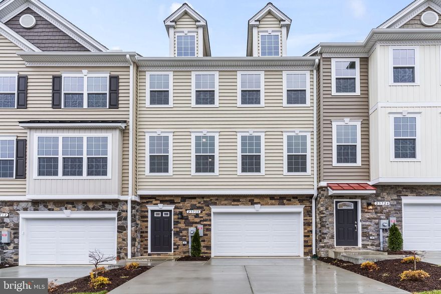 ****Mid May Delivery***

Homesite # 136  Madison D3: 

Welcome to Meadows at Town Run.... Leonardtown’s Newest Townhome Community by Quality Built Homes! Discover the Madison-D3 Interior Unit, a thoughtfully designed 3-level townhome offering 2,554 sq ft of beautifully finished living space. This interior unit features an oversized one-car garage and an entry-level flex space that includes built-in cubbies and coat hooks, plus a versatile room that can function as a fourth bedroom, guest suite, or recreation room, complete with a full bath and closet. 

The main level boasts a spacious and open kitchen with Quartz countertops, brushed nickel fixtures, a center island, large walk-in pantry, and breakfast nook. The open-concept family room flows seamlessly from the kitchen to a 14x12 maintenance-free deck overlooking a fenced backyard—perfect for outdoor entertaining. 

Upstairs, retreat to the owner’s suite with tray ceiling, walk-in closet, and a luxurious Deluxe Signature Shower by QBHI featuring floor-to-ceiling tile, dual showerheads, a built-in seat, ledge, shelving niche, and recessed lighting. Two additional bedrooms, a full hall bath, and a convenient laundry room complete the upper level. 

Community amenities include sidewalks, a swimming pool, recreation center, pickleball and tennis courts, and playgrounds—all located in the heart of charming Leonardtown, Maryland.

Come experience the unmatched quality and thoughtful design that sets Quality Built Homes apart. Schedule your tour today!  Photos shown are representative and intended to illustrate a similar finished townhouse.
