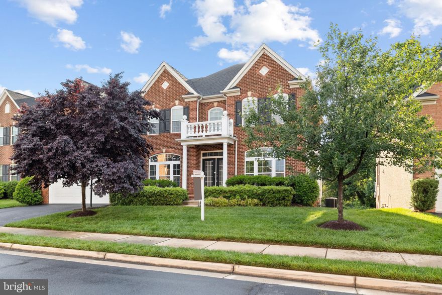 Offer Deadline of Monday 6/3 at Noon.  Owners have the right to accept an offer before deadline if they so choose to.  Welcome to 3991 Woodberry Meadow Drive, a truly exceptional 5 bedroom / 4.5 bathroom home in the sought-after Fairfax community of Kensington Square. Built in 2010, this stunning Wynterhall model, the largest model the builder put in this community, is an all brick single-family home that offers over 5400 square feet of luxury living space, including a recently completed finished basement. The home is nestled on a premium lot, backing to a  more wooded area of the neighborhood, and has been recently refreshed and is move-in ready.  Enjoy the low maintenance lifestyle of the community, as the HOA takes care of all lawn care, leaving you with more time to enjoy your wonderful home!  Step into the main level's 2-story foyer and admire all the natural light that flows in through all the windows.  Beautiful formal living & dining rooms flank the foyer and lead to the impressive 2-story family room.  The gourmet kitchen off the family room, features stainless appliances, granite countertops, custom cabinetry, an incredible stone  backsplash, and a large center island to gather around. Adjacent to the kitchen is a lovely dining space with draped in a high end wall paper, overlooking the scenic views of the back yard.  As you make your way through the kitchen, you have a large mud room with your washer/dryer and access to your oversized 2 car garage.  The main level also features an updated half bath and a spacious home office.  Make your way up either staircase to second floor, where you will find your luxurious primary suite, that offers a spacious layout, tray ceiling, and an en-suite bathroom with 2 walk-in closets!  The 3 additional bedrooms are generously sized and served by 2 full bathrooms. The top two levels feature hardwood floors throughout!  The finished basement in an entertainers paradise.  The full sized bar features a wine fridge and a microwave oven.  There is plenty of room to spread out and relax in the enormous rec room!  The basement also has your 5th bedroom and an additional full bathroom, perfect for visiting guests or family.  Updates include: New Hot Water Heater (2023), both HVACs changed in 2019, full basement done in 2023, updated all upper bathroom tiles in 2021. Community amenities include a basketball court, playground, walking/jogging paths, and landscaped parks.  The home is minutes away from a variety of dining and shopping and enjoy the proximity to major commuter routes, Fair Oaks Hospital, and International Country Club. Everything you need is within reach, making this home an ideal choice for those seeking a well-rounded and vibrant lifestyle, welcome home!