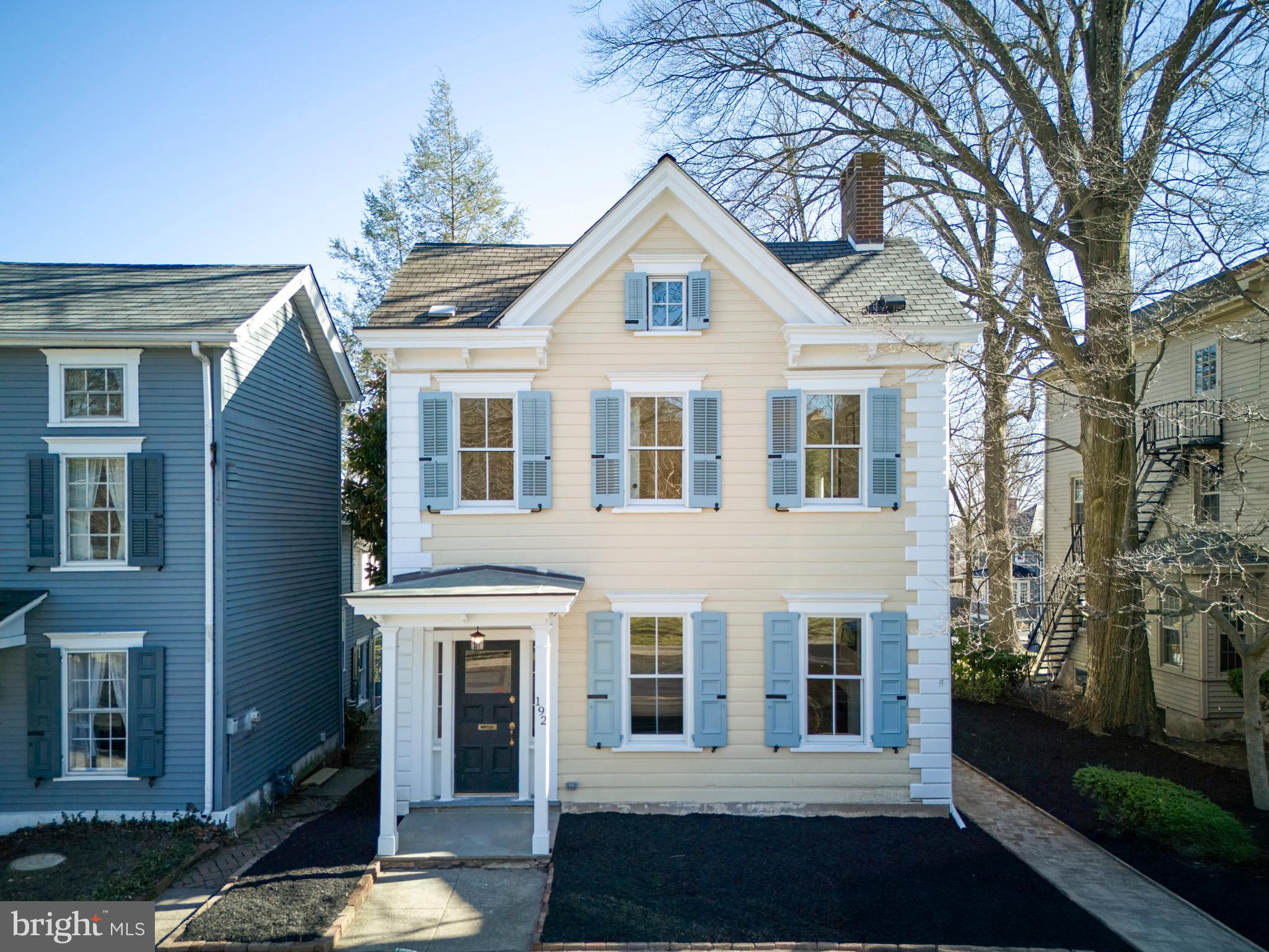 Welcome home to the Thomas McIntosh House, an exquisite 1857 historic residence that has been completely remodeled to the highest standards. The 5-bedroom, 3.1-bathroom home seamlessly blends its rich historical charm with the finest modern upgrades, offering a rare opportunity to experience refined luxury in the heart of Doylestown Borough. From the moment you arrive, the meticulously crafted exterior impresses, featuring a new brick sidewalk leading to the side entry, a beautifully updated portico with new trim, and a spacious new deck. Step inside to discover a home where timeless elegance meets contemporary sophistication. Refinished wide-plank white oak floors flow throughout the first and second floors, complemented by custom-rubbed bronze floor registers and recessed lighting. Every room is bathed in natural light thanks to newly installed, energy-efficient windows, while preserving the home's historic beauty. The gourmet kitchen is a chef's dream, featuring stunning quartz countertops, custom soft-close cabinetry, a chic tile backsplash, and state-of-the-art Bosch stainless steel appliances, including a 6-burner gas range, refrigerator, dishwasher, and microwave drawer. A beautifully appointed dry bar, with an original piece of metal stove incorporated into the design, adds a distinctive touch of historic charm. On the first floor, the grandeur continues with a decorative fireplace in the great room surrounded by intricate trim and wainscoting, paired with custom built-ins for both form and function. Sophisticated new light fixtures continue into the spacious dining room. The new powder room exudes character, featuring a striking exposed stone wall. The versatile bedroom or office, offering dual closets and its own en suite bathroom, is an ideal retreat, complete with a frameless glass shower, new vanity, and a toilet closet with exquisite exposed stone accents. A generously sized laundry room completes the main level, adding both functionality and convenience. Upstairs, the spacious primary suite is a true sanctuary, offering a decorative fireplace, wainscoting, and both a linen closet and a walk-in closet. The luxurious en suite bathroom was designed with indulgence in mind, featuring a dual vanity, an oversized tiled shower with a bench seat, and a private toilet closet. The second bedroom offers two closets and graceful arch details that echo the home’s original design, while the third bedroom boasts a private balcony, two closets, and ample natural light. The second-floor full bathroom features a tub shower, dual vanity, and a private toilet closet. The third floor is a blank canvas, offering space for an additional bedroom, home office, gym, playroom, or whatever suits your needs. It's fully insulated, HVAC-conditioned, carpeted for comfort, and features a small closet. The basement is equally impressive, with engineered reinforcement plans for additional support, a sump pit and pump, and both interior and exterior access. The two-car garage comes with new doors and a gravel parking area for added convenience and exclusivity. This extraordinary home is equipped with every modern convenience, including a new 200-amp electrical panel, a subpanel in the garage, energy-efficient two-zone HVAC with central air, a new oversized hot water heater, and a complete upgrade to PVC plumbing. The home also features spray foam insulation throughout, ensuring year-round comfort and energy efficiency. The sewer lateral to the street has been replaced, ensuring the home’s structural integrity for years to come. Experience the perfect balance of historic elegance and contemporary luxury in this exceptional Doylestown Borough residence, just blocks away from restaurants, boutiques, & musuems. Assigned to Central Bucks School District. Schedule your private showing today and make this unparalleled property your new home!