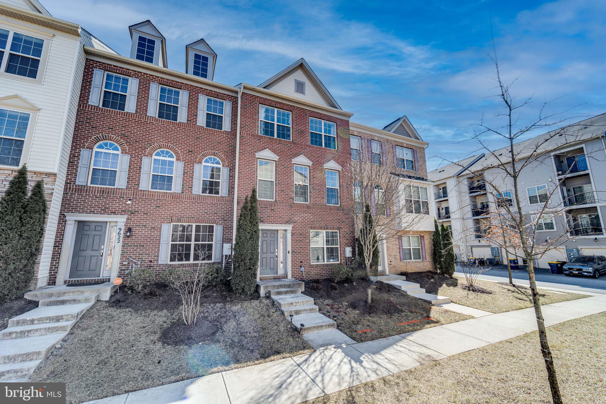 **Call regarding $10,000 Homebuyer Access Grant for down payment on this home. ** Welcome to your dream townhome in the heart of Woodmore Town Center! This immaculate, three-level brick-front beauty is packed with space, style, and all the modern comforts you’ve been searching for. Step inside to an open-concept main level featuring gleaming hardwood floors throughout, a gourmet kitchen with granite countertops, a full suite of stainless steel appliances, and a spacious breakfast island—perfect for morning coffee or entertaining guests. The separate dining area adds a touch of elegance for your special gatherings.
Upstairs, you’ll find three generously sized, plushly carpeted bedrooms, including a luxurious owner’s suite with a walk-in closet and a spa-like ensuite bathroom featuring dual sinks and a sleek design. The lower level offers even more versatility with an additional bedroom, a full bath, and a flex space—ideal for a home office, gym, or media room. Plus, your two-car garage ensures convenience and extra storage.
Located in a vibrant community with shopping, dining, and entertainment just moments away, this townhome is a must-see. Don't miss your chance to call it home! Schedule your tour today!